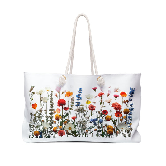 FireBrook Designs shoulder bag featuring a vibrant floral pattern. The elegant accessory combines style and functionality, embodying the store's ethos of uplifting, joyful design.