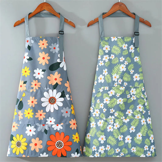 A blue apron adorned with white flowers, showcasing a cheerful floral pattern. Perfect for adding a touch of joy and style to your daily routine.