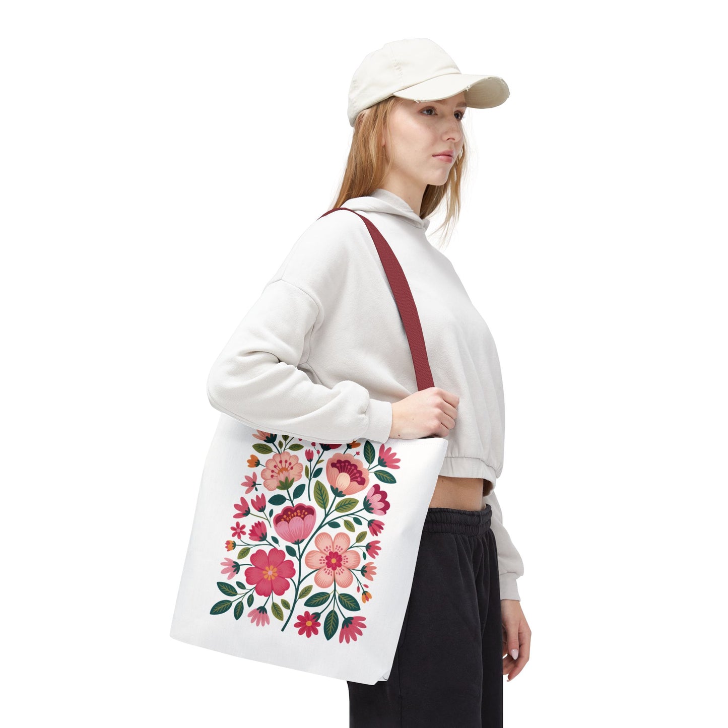Pink Floral Folk-Art Style Tote Bag showcasing vibrant pink-toned flowers and dusty green leaves, perfect for carrying essentials. Designed for art enthusiasts and nature lovers, embodying FireBrook Essentials' joyful and uplifting style.