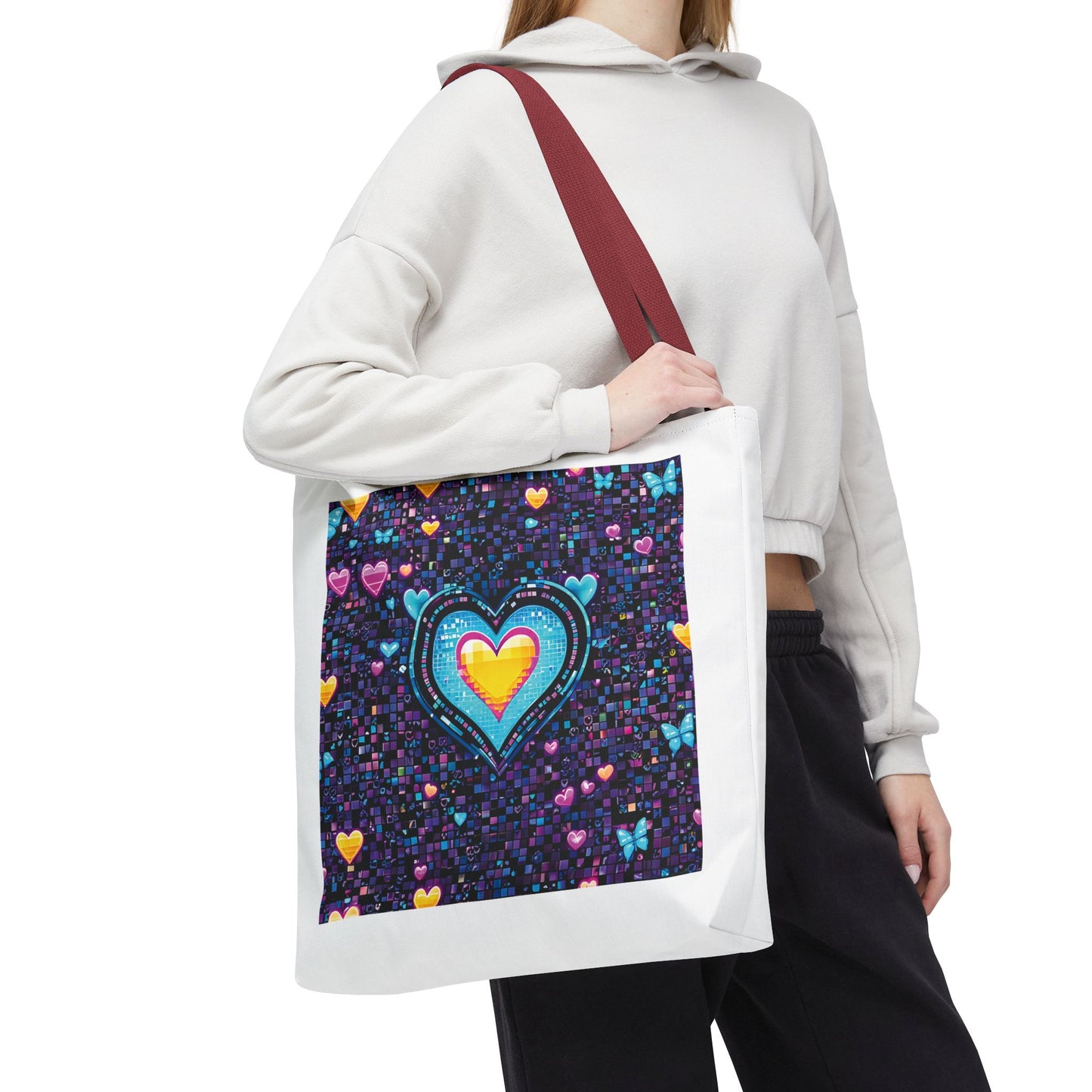 Heart Pixelated Nostalgic Cyber-Aesthetic Tote Bag held by a person, showcasing its unique design with reinforced handles, ideal for stylish everyday use.