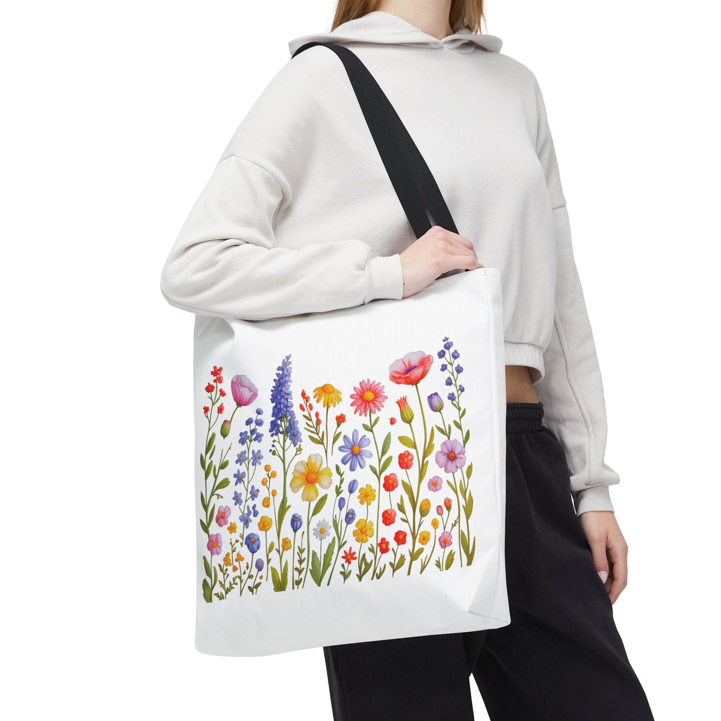 Wildflowers Tote Bag featuring a vibrant wildflower design, ideal for nature lovers. Durable polyester with reinforced handles, perfect for spring and summer outings. Available in three sizes, aligning with FireBrook Essentials' uplifting style.