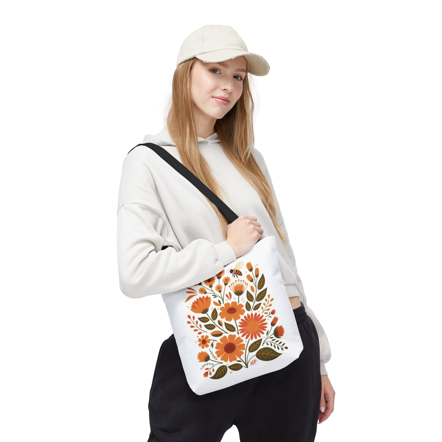 Folk Floral Tote Bag showcasing hand-drawn wildflowers, perfect for nature enthusiasts. Ideal for daily use, with reinforced handles and boxed corners for durability, available in three sizes.