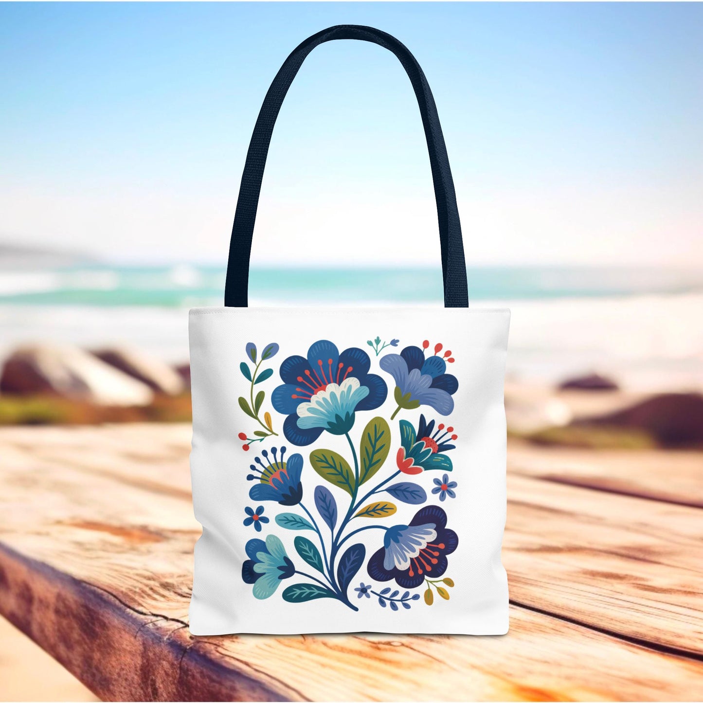 Vintage Folk Art Design Blue Floral Tote Bag showcasing a charming, nostalgic look with a unique blue floral pattern. Perfect for everyday use or special occasions, designed for those who love standing out.
