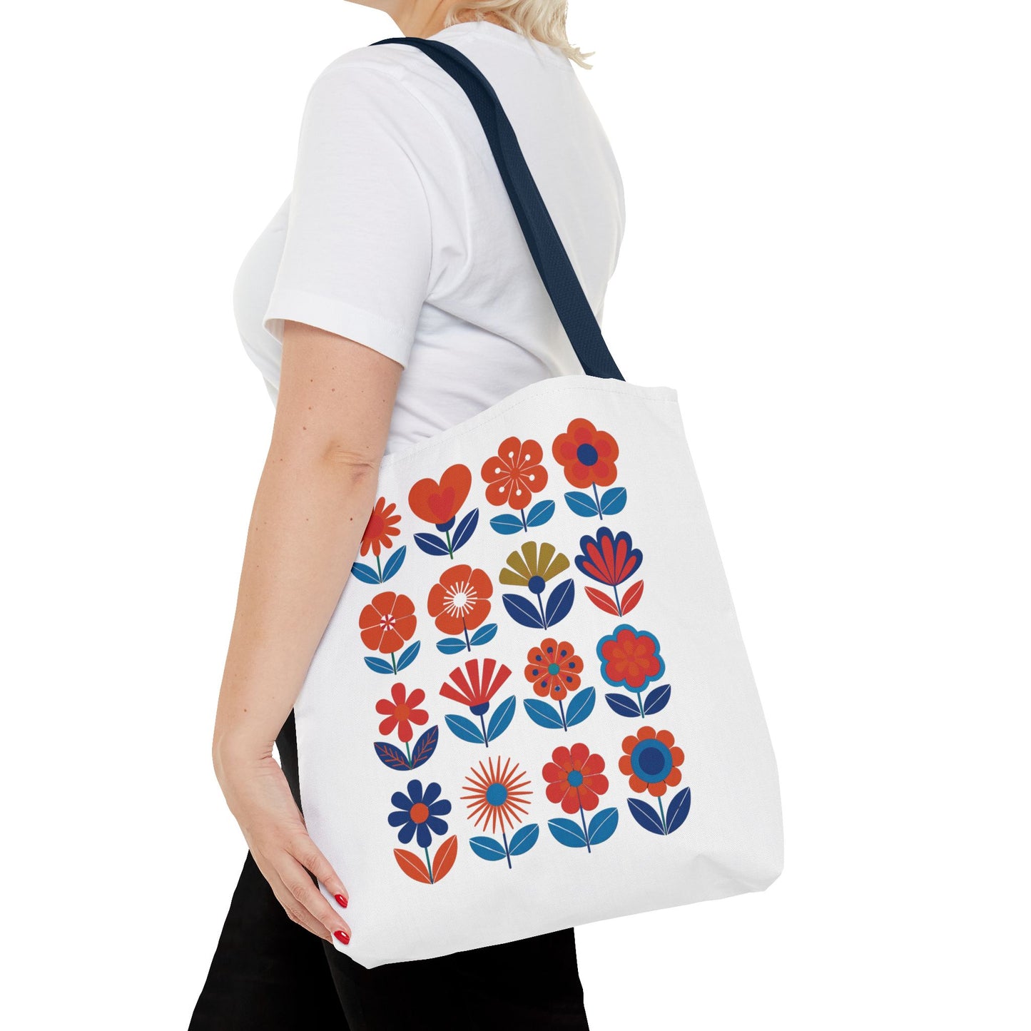 Floral Tote Bag featuring mid-century modern floral designs, ideal for everyday use. Durable polyester with reinforced stitching and boxed corners, offering style and functionality for carrying essentials.