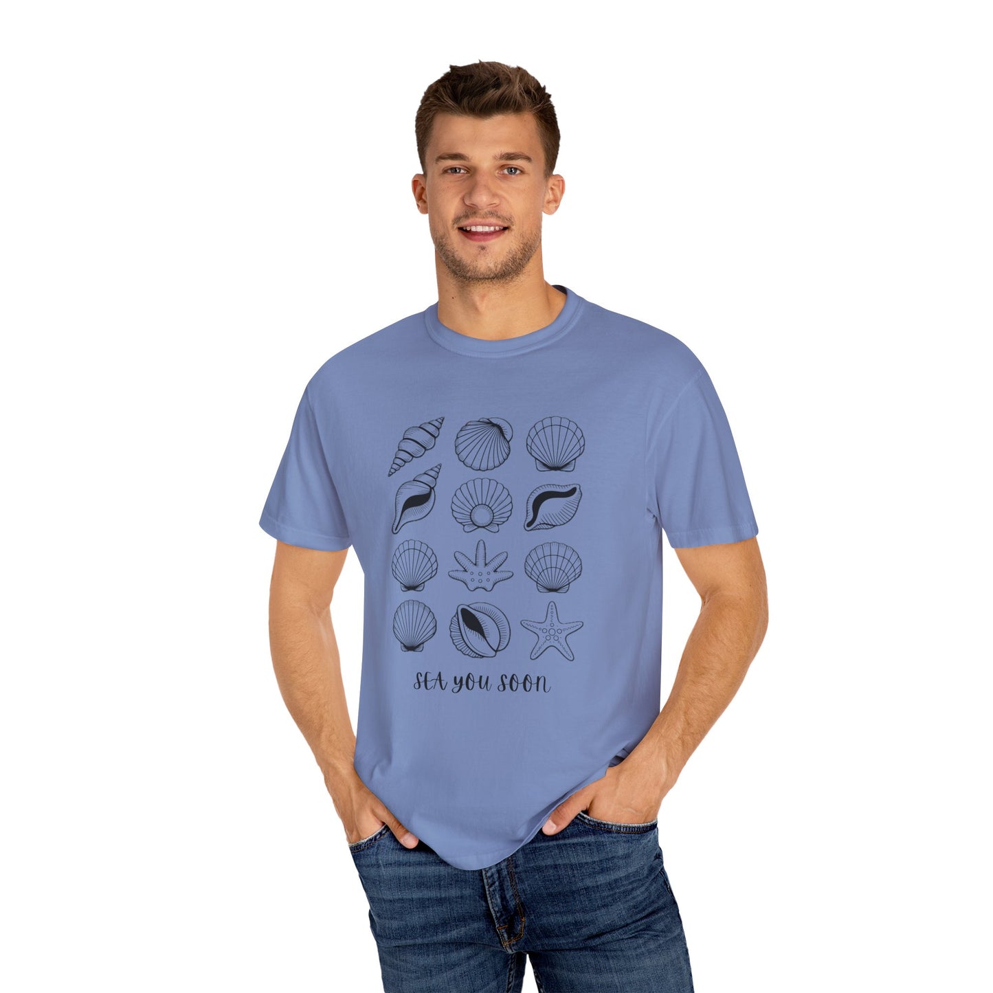 Seashells and Sea You Soon T-Shirt displaying a relaxed fit with a beach-inspired design of seashells and text, capturing a laid-back, ocean-loving vibe, ideal for casual beach outings.