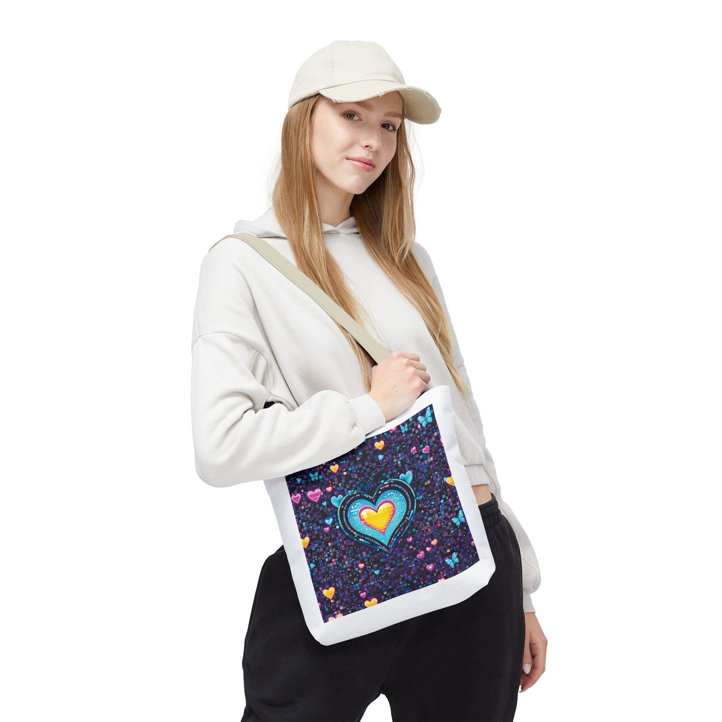 Woman holds Heart Pixelated Nostalgic Cyber-Aesthetic Tote Bag, showcasing its vibrant Y2K-inspired design ideal for stylish, everyday use.