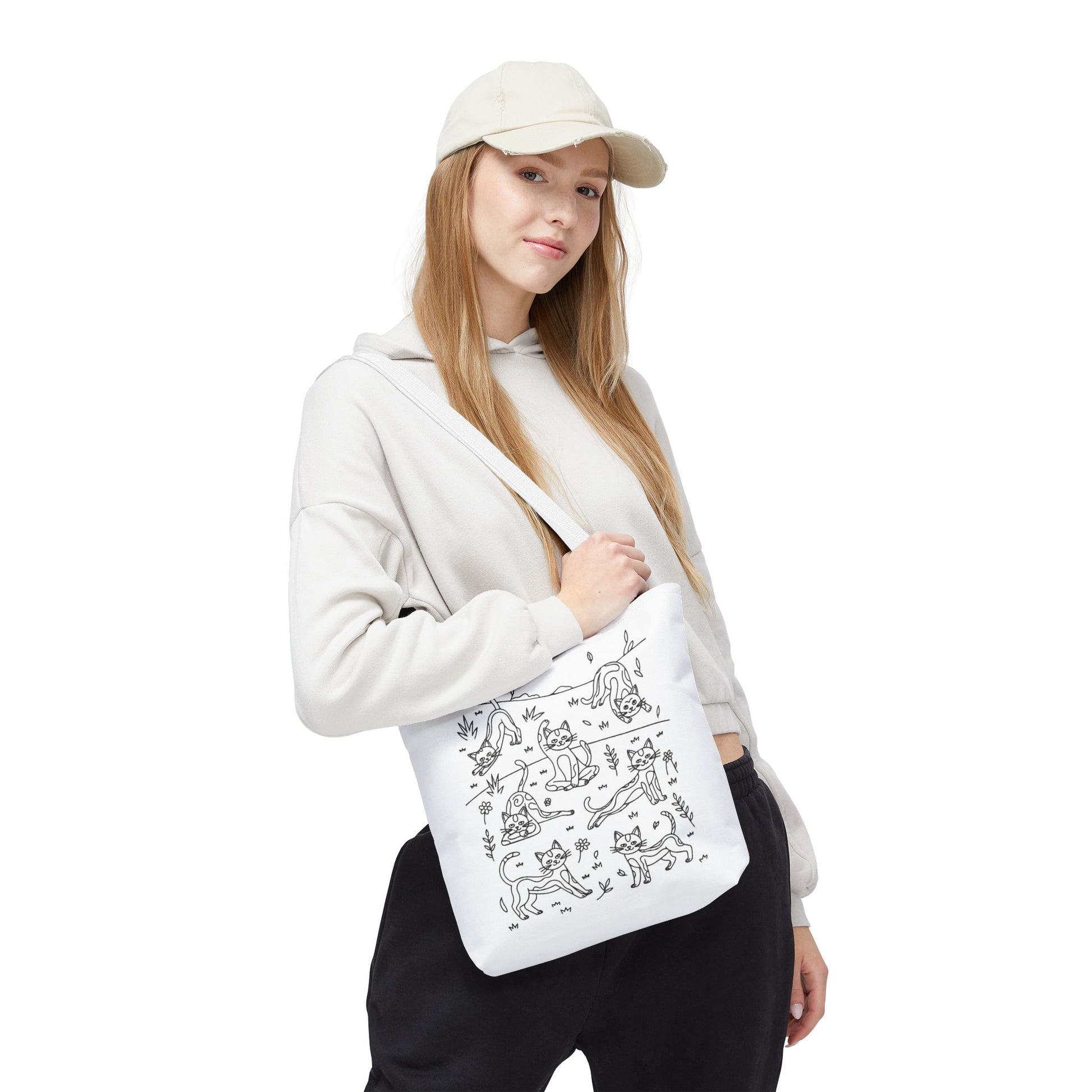 Yoga Cat Tote Bag featuring playful cat yoga poses, perfect for errands or gym essentials. Reinforced handles and boxed corners ensure durability and space, aligning with FireBrook Essentials' joyful and stylish design ethos.