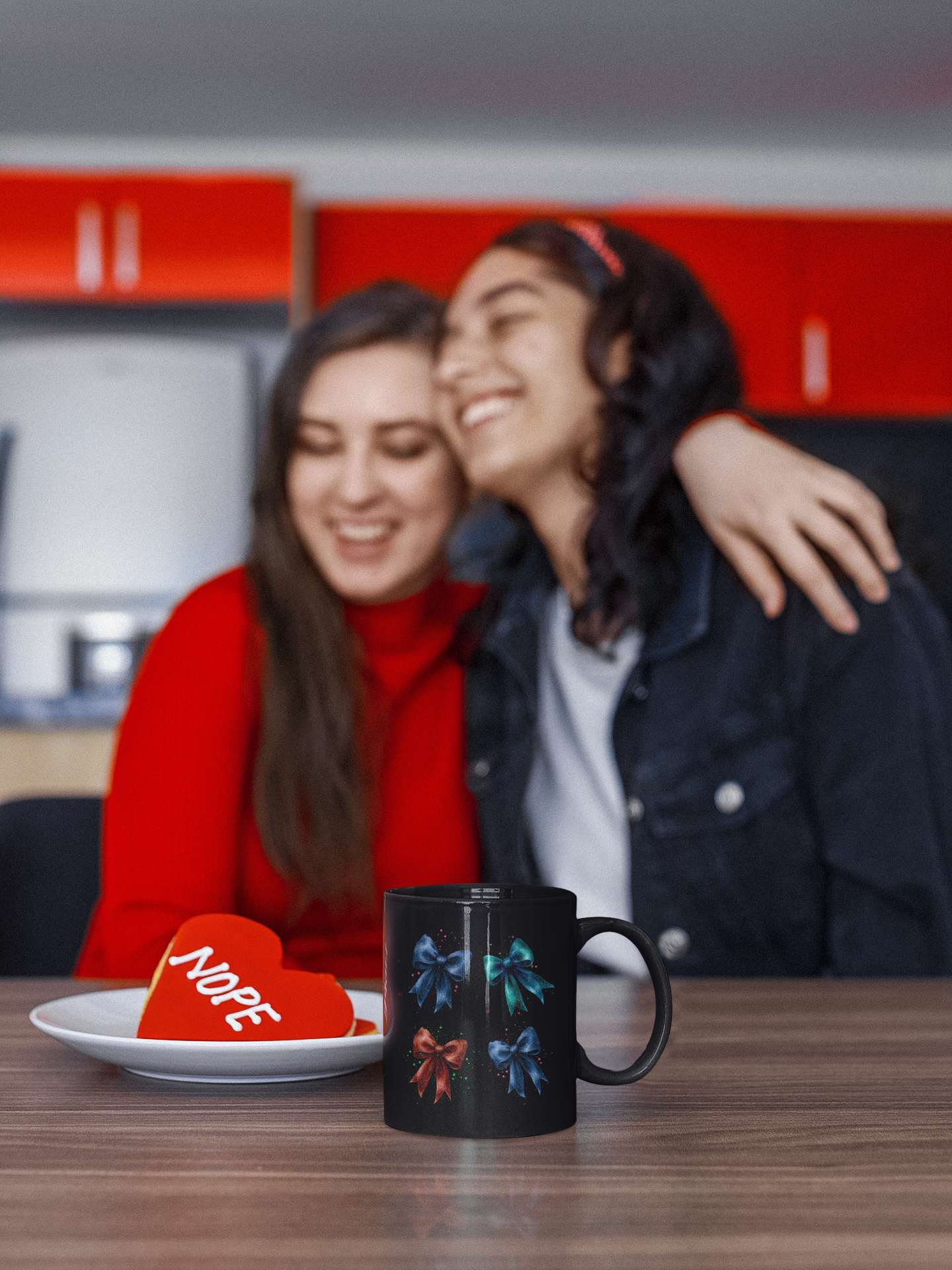 Close-up of the Bows Ribbons Mug, showcasing its glossy black ceramic surface with vibrant designs. Available in 11oz and 15oz sizes, this mug features a convenient C-shaped handle.