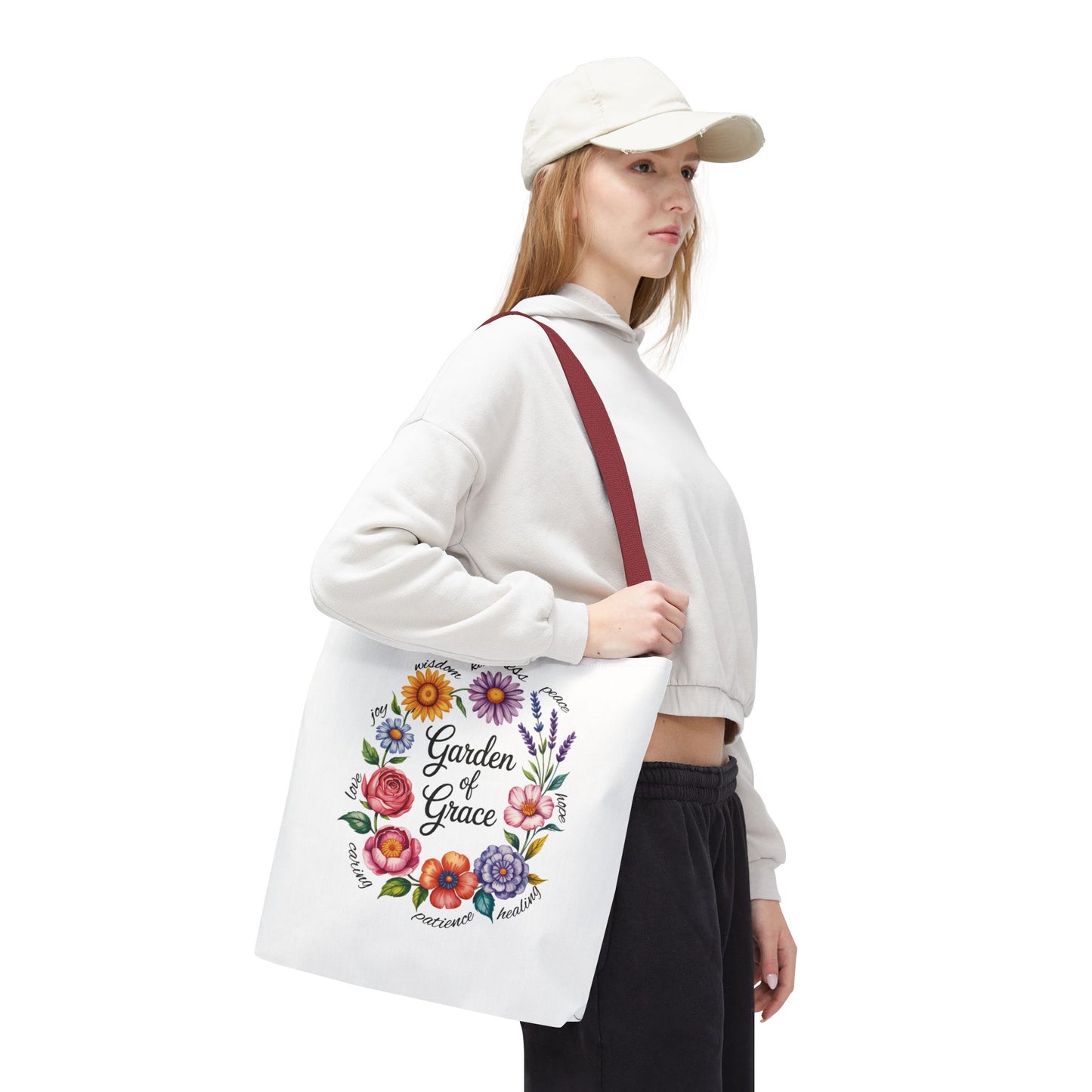 Garden of Grace Watercolor Design Tote Bag showcases hand-drawn pastel flowers and elegant script, embodying nature's charm. Ideal for everyday use, it reflects FireBrook Essentials' uplifting style.
