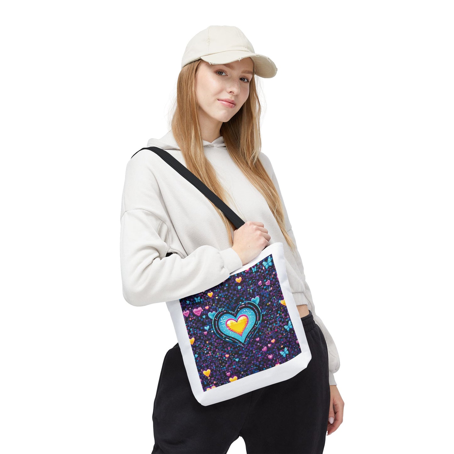 Woman holding Heart Pixelated Nostalgic Cyber-Aesthetic Tote Bag with pixelated hearts and butterflies, showcasing its stylish design and roomy structure for everyday use.