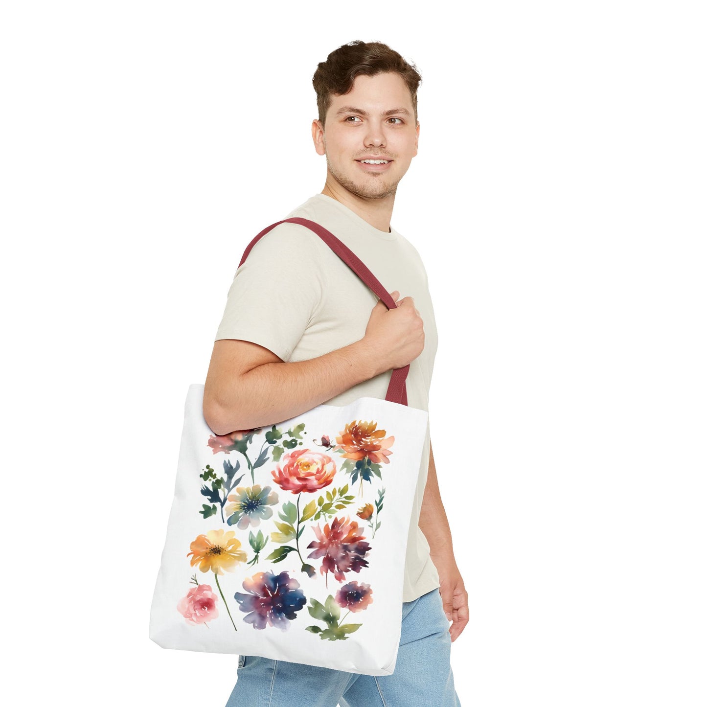 Man smiling while holding the Watercolor Floral Tote Bag, showcasing its artistic flower design and practical, durable features for everyday use.