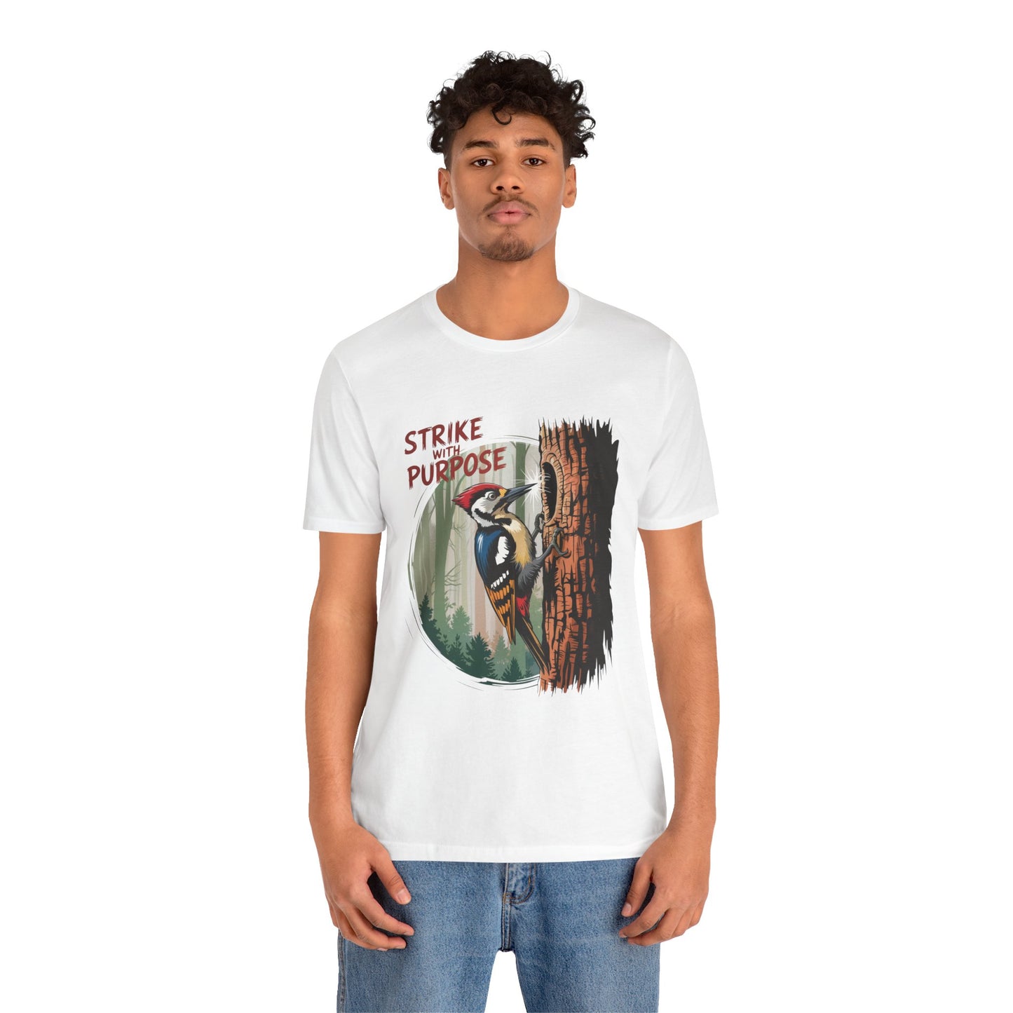 Woodpecker: Strike with a Purpose Bella+Canvas Unisex T-Shirt, featuring a vibrant woodpecker design. The man models this casual, motivational tee, perfect for nature lovers and those seeking inspiration.