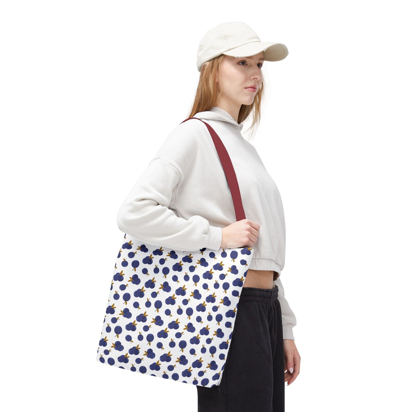 Blueberry Tote Bag with charming blueberry pattern, durable polyester fabric, reinforced handles, and boxed corners, exemplifies FireBrook Essentials' blend of style and practicality for everyday use.