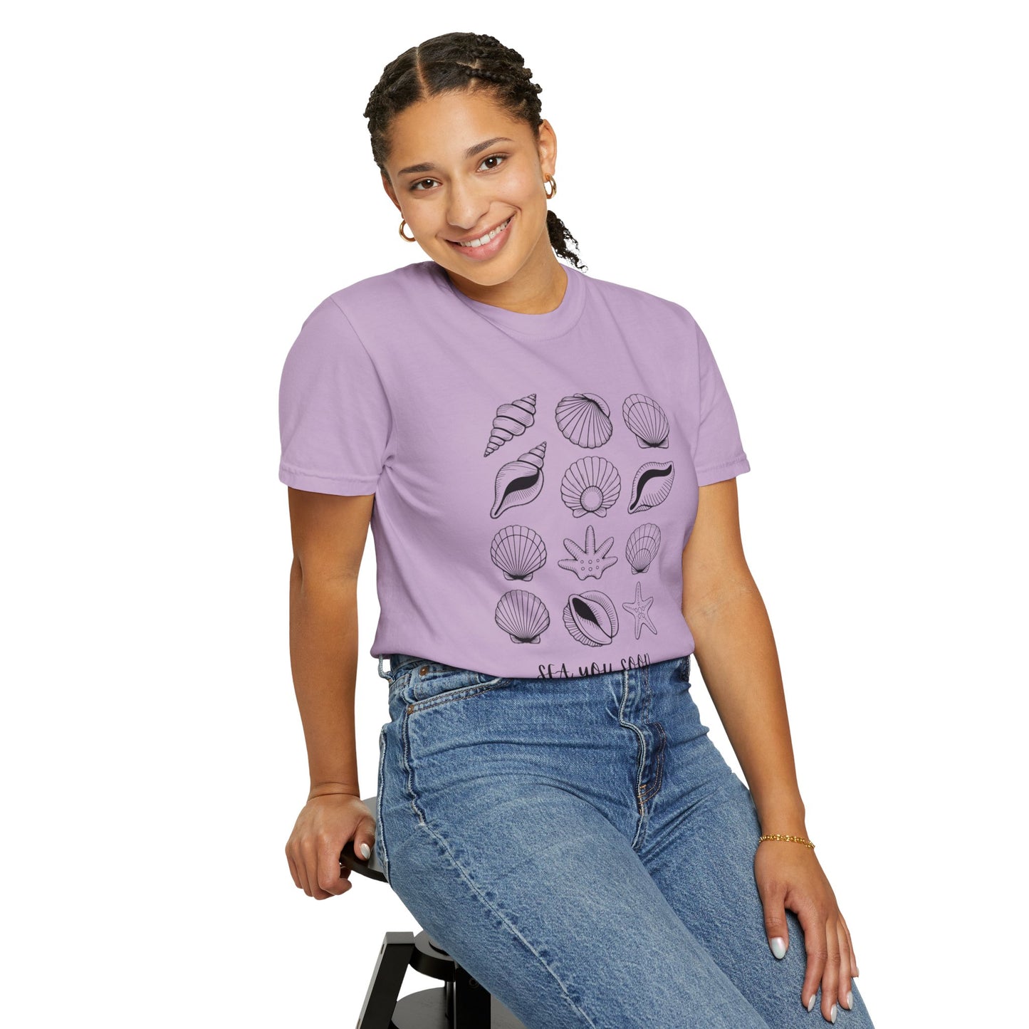 Seashells and Sea You Soon T-Shirt showcasing a seashell design with the phrase Sea You Soon, embodying a relaxed beach vibe. Ideal for ocean lovers, offering comfort with its crew neckline and relaxed fit.