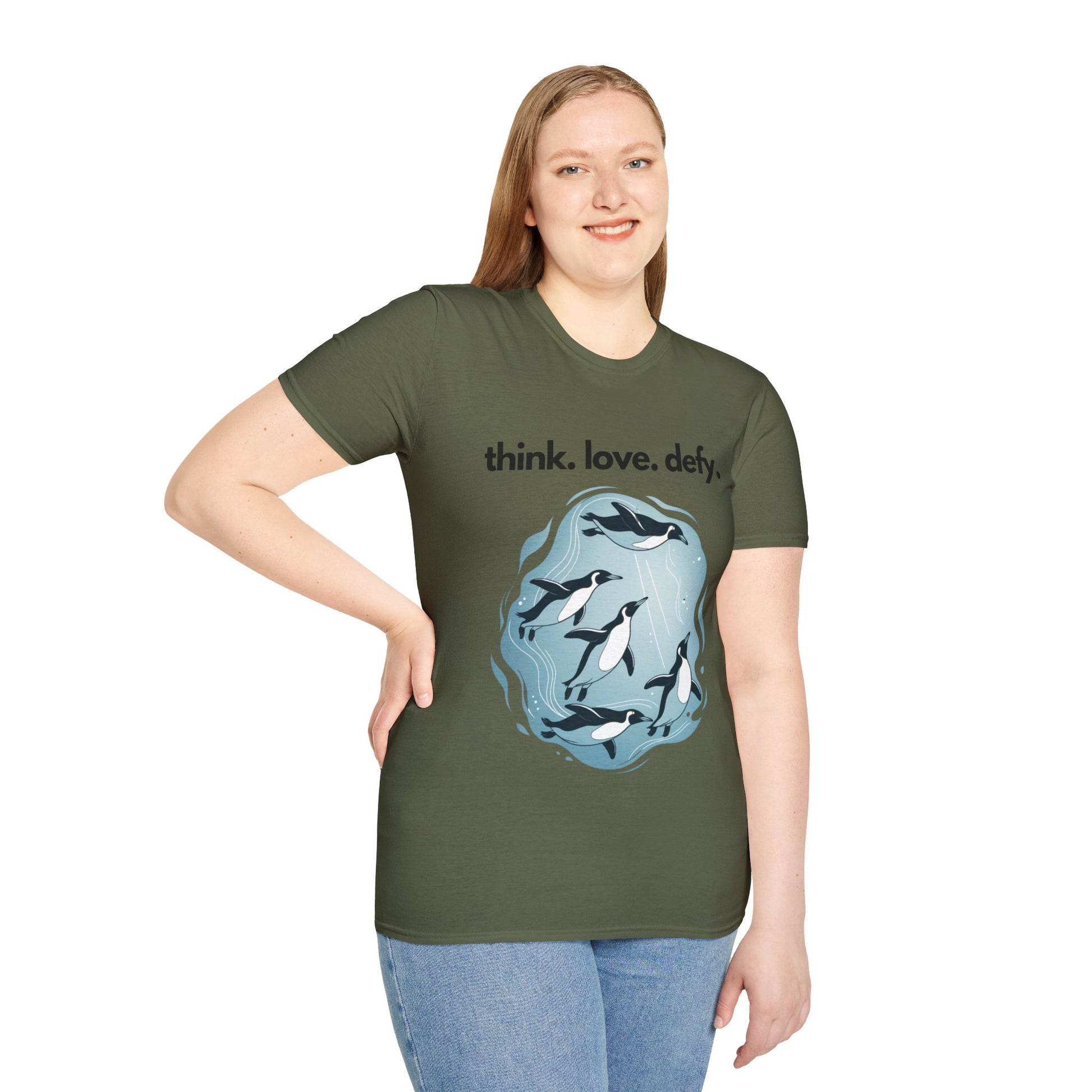 Think Love Defy Penguin Animal Nature Gildan Unisex T-Shirt with penguin design, worn by a smiling woman, showcasing casual and stylish comfort from FireBrook Essentials.