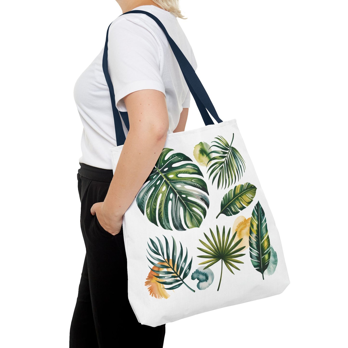 Tropical Leaves Tote Bag featuring a close-up of vibrant leaf patterns, showcasing durability and spaciousness, ideal for beach outings and everyday use, embodying FireBrook Designs' commitment to style and positivity.