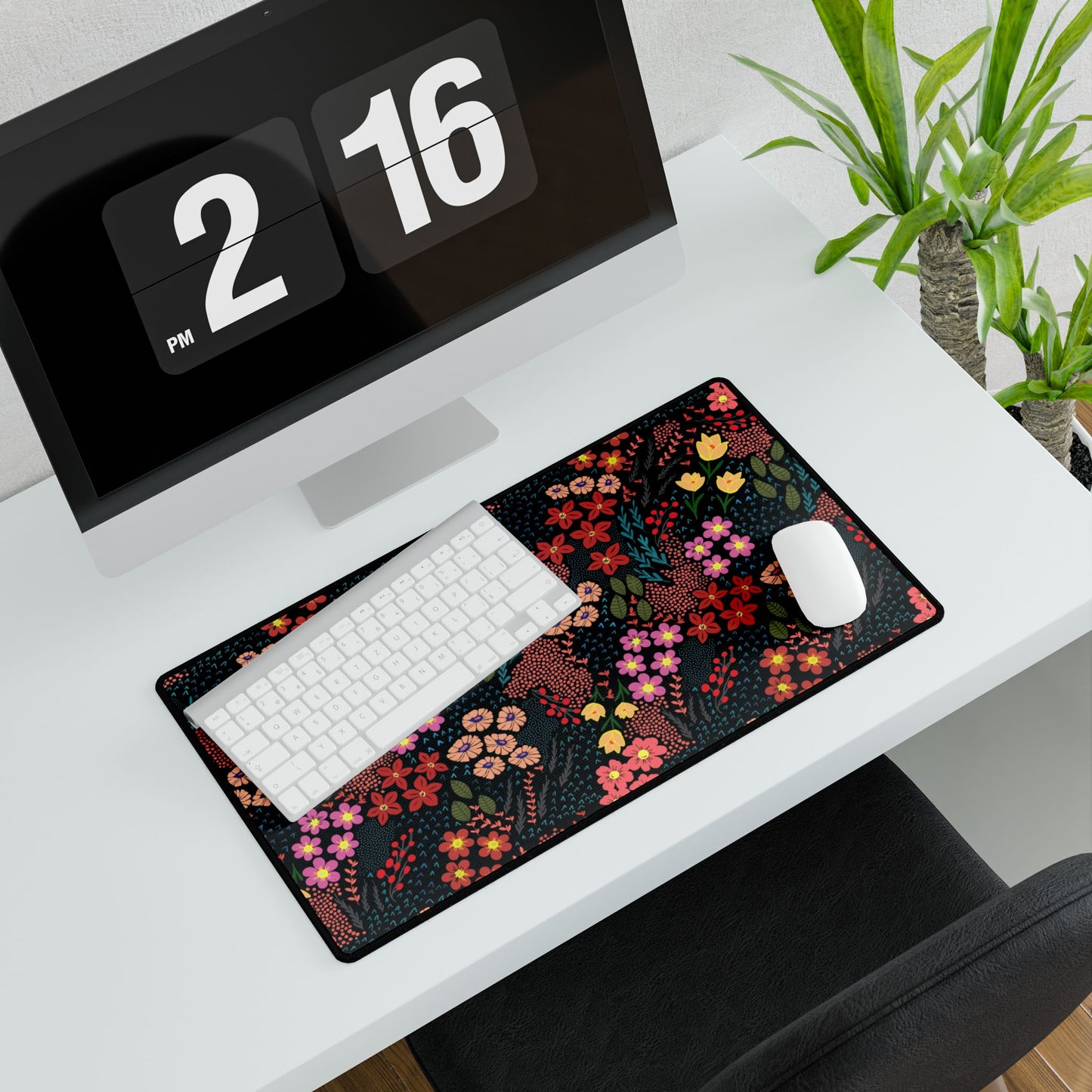 Desk Mat - Midnight Garden Floral Pattern: A vibrant floral desk mat underlines a minimalist workspace, featuring a keyboard and mouse, adding nature-inspired elegance and color to enhance your desk setup.