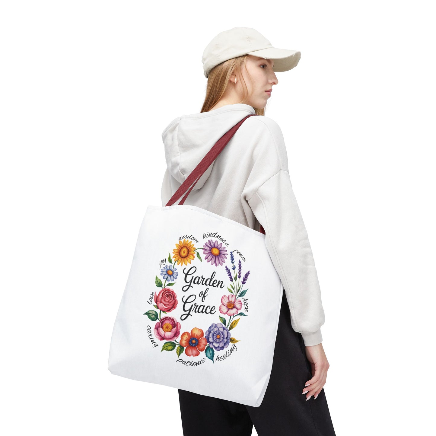Garden of Grace Watercolor Design Tote Bag showcases hand-drawn flowers with 'Garden of Grace' text, embodying elegance and nature appreciation; perfect for adding charm and joy to daily life.