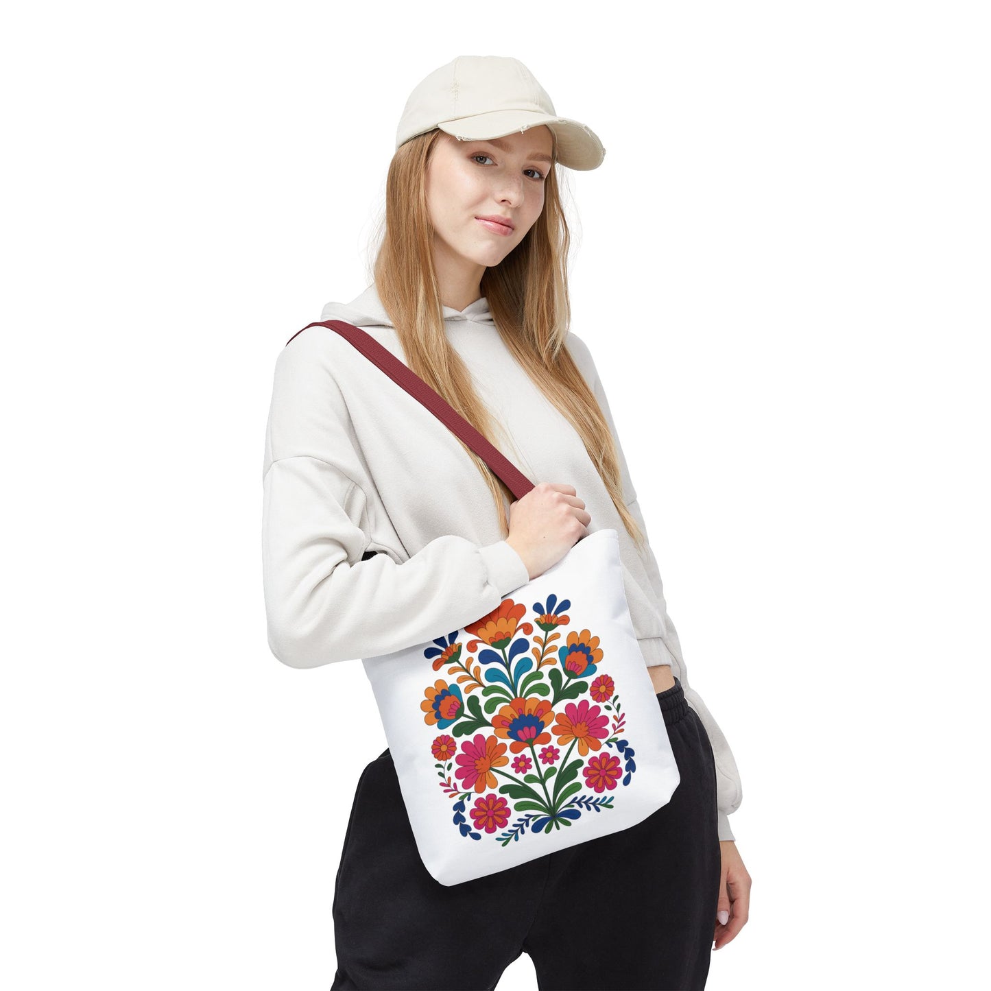 Red Folk-Art Floral Tote Bag featuring an organic floral illustration in red tones with bold, delicate flowers and green leaves, perfect for nature lovers and art enthusiasts.