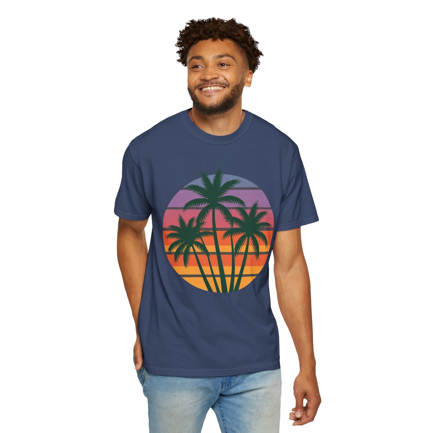 Palm Tree Sunset T-shirt showcasing a colorful palm tree silhouette against a sunset sky, embodying a tropical, relaxed vibe. Perfect for casual outings, made with soft, durable garment-dyed cotton.