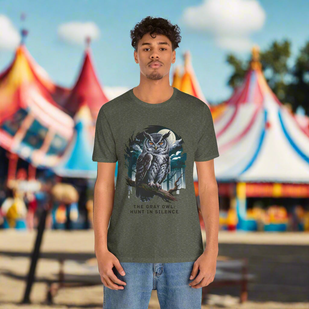 The Gray Owl: Hunt in Silence Bella+Canvas Unisex T-Shirt features an owl print, captured on a person, reflecting a casual style, perfect for nature enthusiasts and outdoor activities.