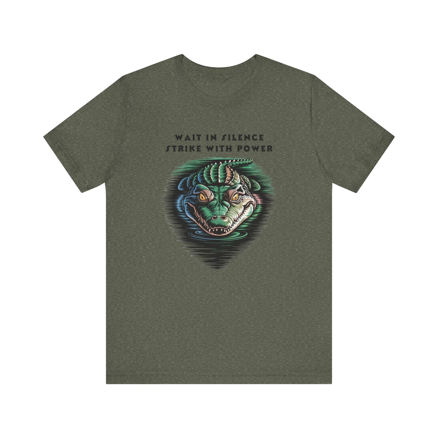 Crocodile: Walk in Silence, Strike with Purpose Bella+Canvas Unisex T-Shirt featuring a detailed graphic of a green alligator with yellow eyes, capturing a sense of stealth and determination.