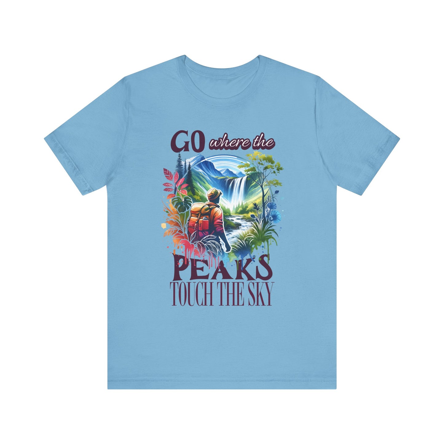 Go Where the Peaks Touch the Sky Bella+Canvas Unisex T-Shirt features a man on a bike and a waterfall, symbolizing adventure and nature. Ideal for outdoor enthusiasts from FireBrook Essentials.