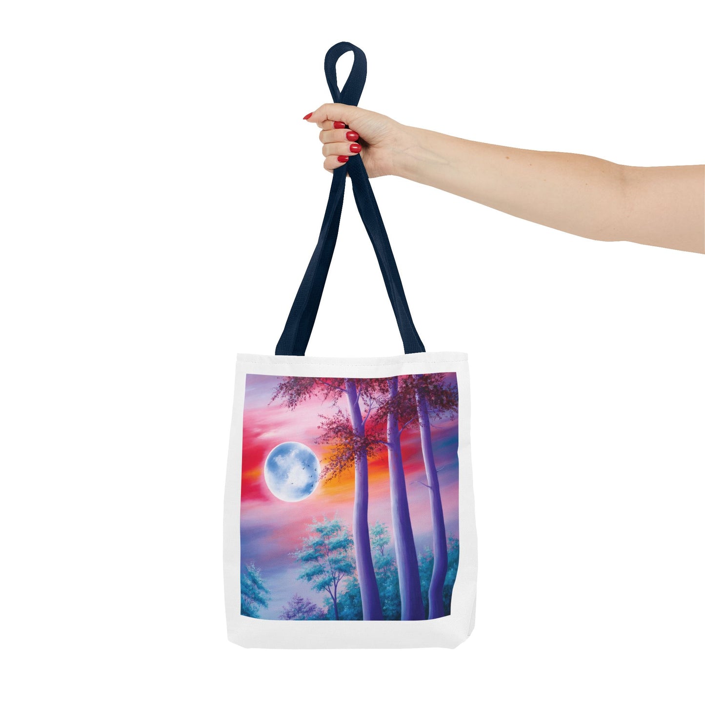 Moonlit Forest Tote Bag featuring a mystical full moon scene with towering trees against a dramatic sunset sky, perfect for art enthusiasts and everyday use. Durable polyester, reinforced handles, available in three sizes.
