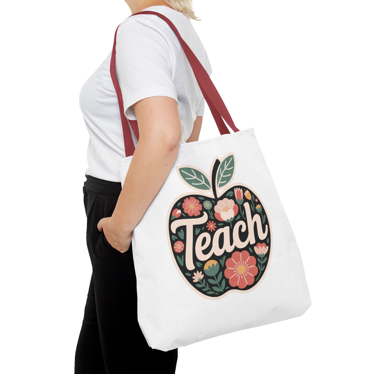 Floral Apple Tote Bag - Hand-Drawn Pastel-Colored Design with 'TEACH', showcasing a cheerful apple shape adorned with floral illustrations, perfect for educators and nature lovers. Ideal for stylish, durable everyday use.