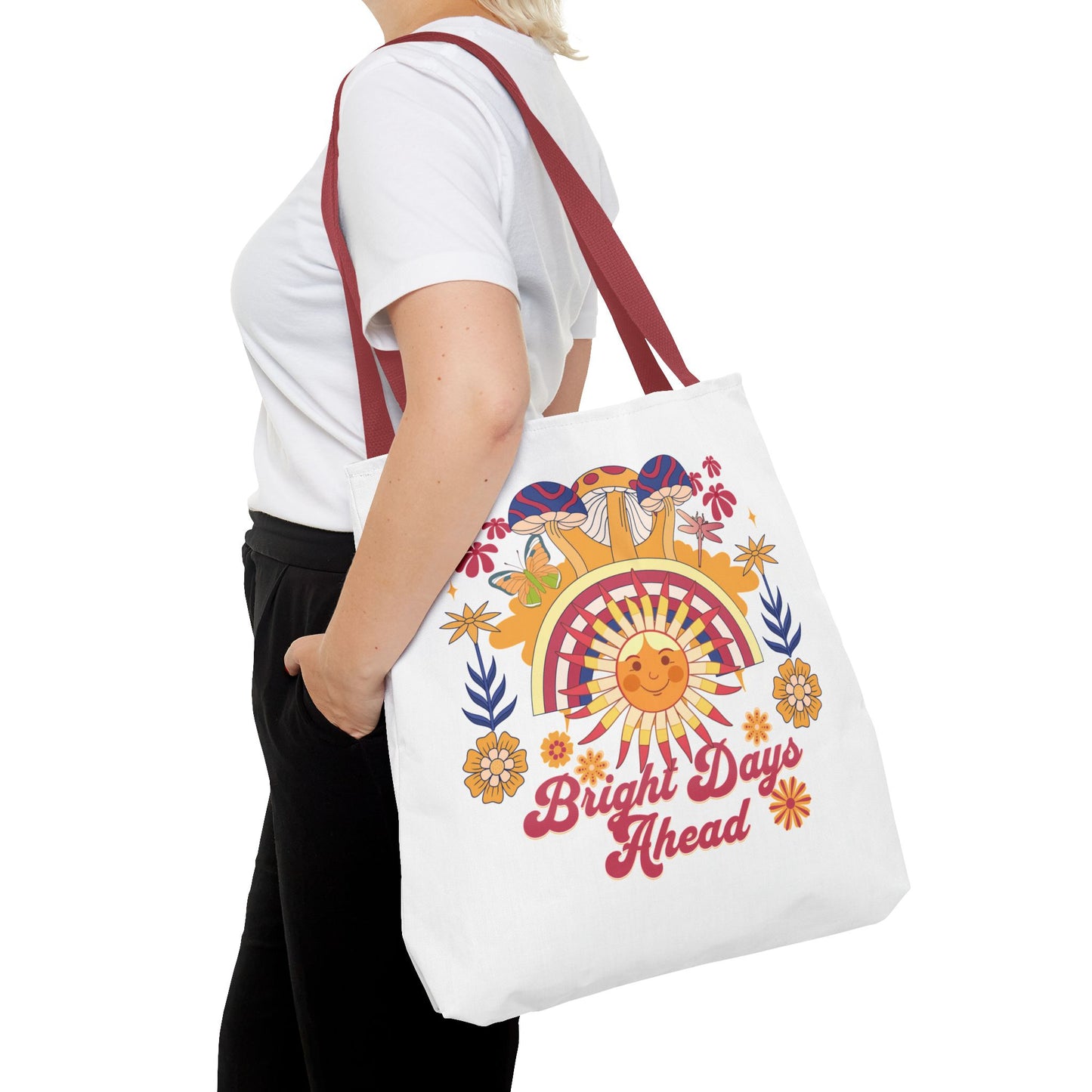 Bright Days Ahead Sunshine Floral Tote Bag depicts a cheerful design with sunshine, flowers, and butterflies, reflecting FireBrook Essentials' uplifting style, ideal for sunny outings like beach trips or farmers market visits.