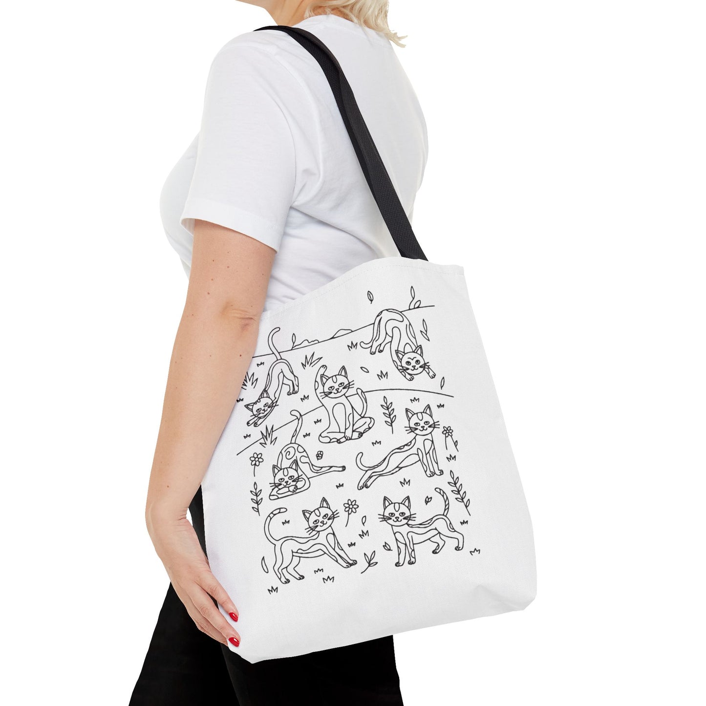 Yoga Cat Tote Bag with whimsical cat yoga poses, perfect for daily errands. Durable polyester, reinforced handles, and boxed corners offer practicality and charm for cat-loving yoga enthusiasts. Available in three sizes.
