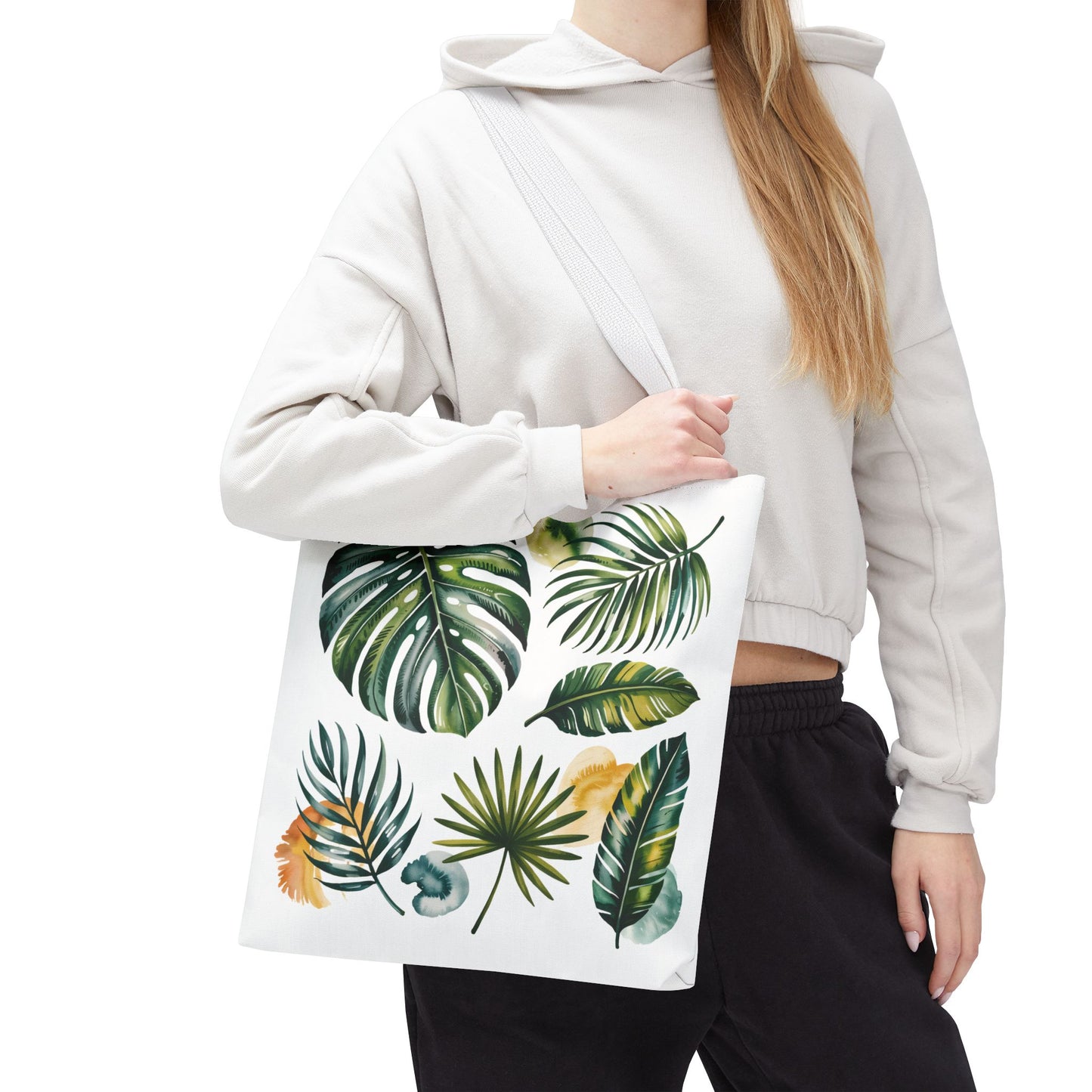 Tropical Leaves Tote Bag with a fresh, summery vibe, featuring close-up leaf patterns. Ideal for beach or shopping, this spacious, durable tote offers stylish, eco-conscious utility, aligning with FireBrook Essentials' uplifting design ethos.