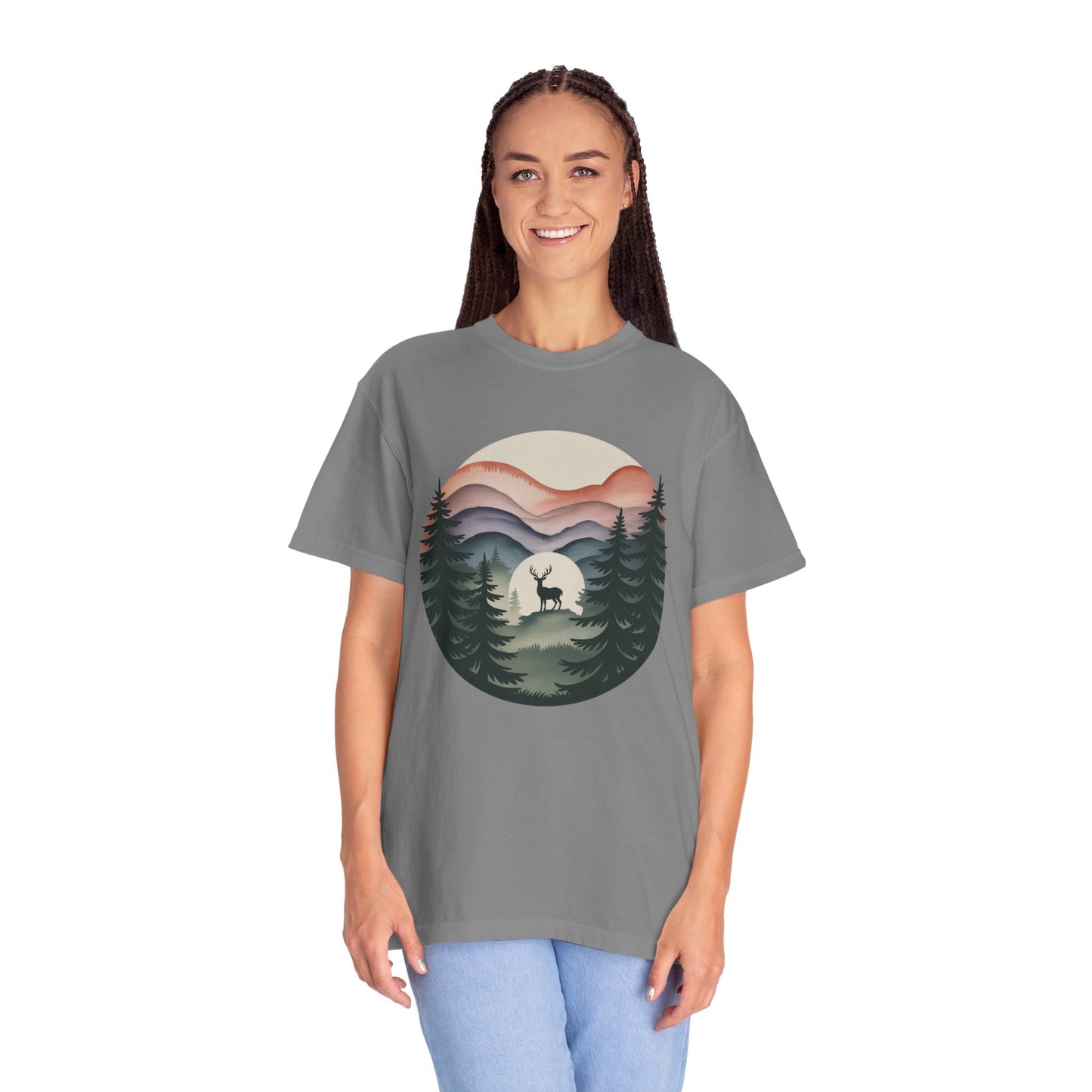 Nature Wanderer T-Shirt features a serene pine forest and mountain silhouette design with a celestial moon and minimalist stag, embodying wilderness tranquility. Ideal for nature lovers seeking stylish, comfortable apparel.