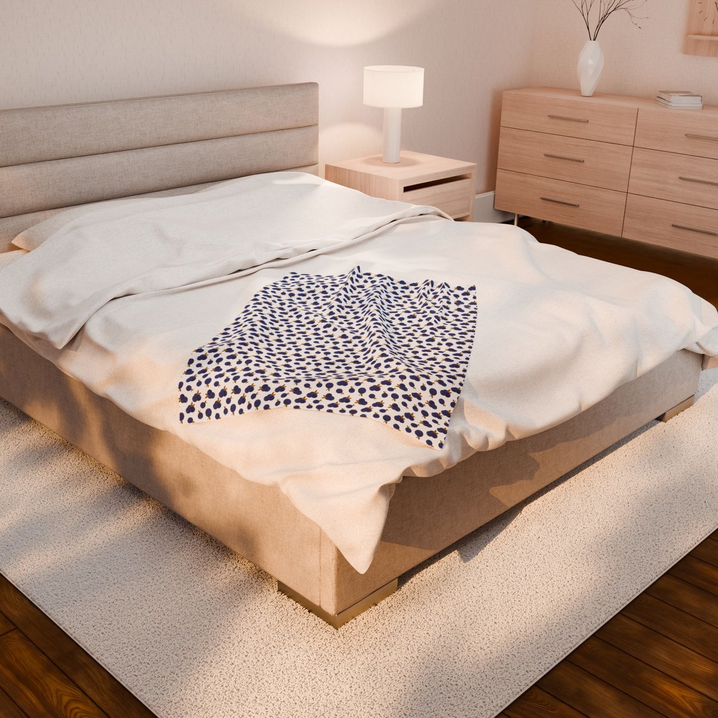 Plush Blanket - Blueberry Pattern draped over a bed, showcasing its cozy and plush texture, ideal for enhancing home decor with warmth and comfort, as seen in FireBrook Designs' joyful essentials collection.