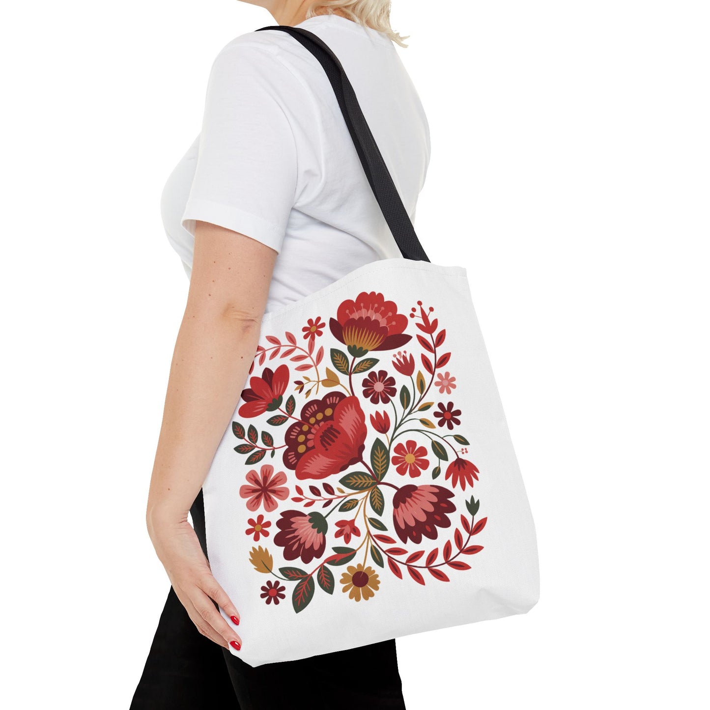 Red Floral Folk-Art Style Tote Bag featuring vibrant organic floral illustrations. This lively design showcases bold red tones, soft blush, blue flowers, and green leaves, perfect for everyday use.