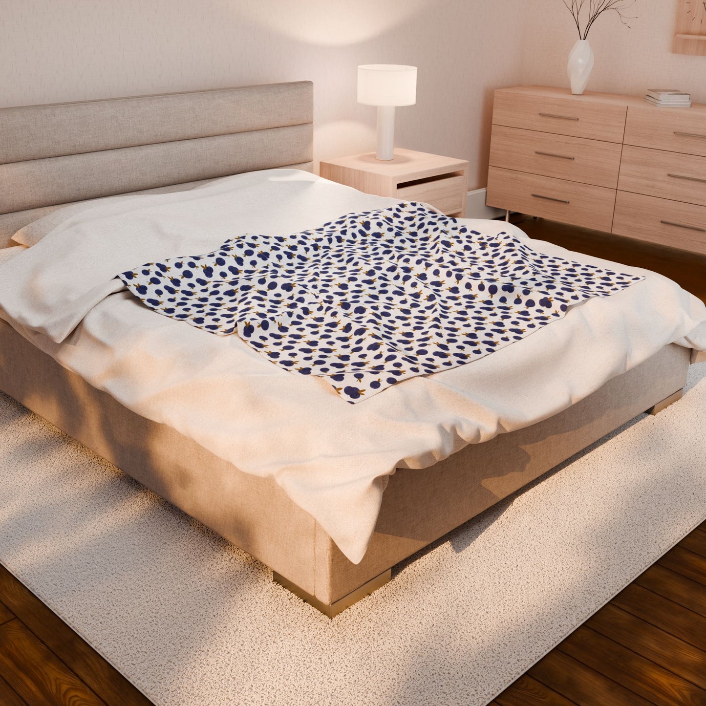 Plush Blanket - Blueberry Pattern displayed on a bed, showcasing its cozy and warm texture, ideal for snuggling. A perfect addition to home decor, embodying FireBrook Designs' commitment to comfort and style.