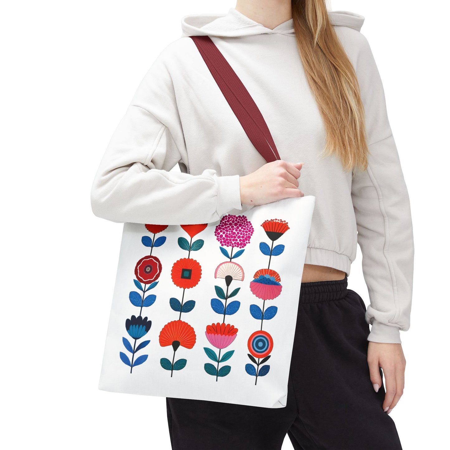 Floral Pattern Tote Bag held by a woman, showcasing its vibrant flower design, ideal for versatile use and enhanced with durable construction.