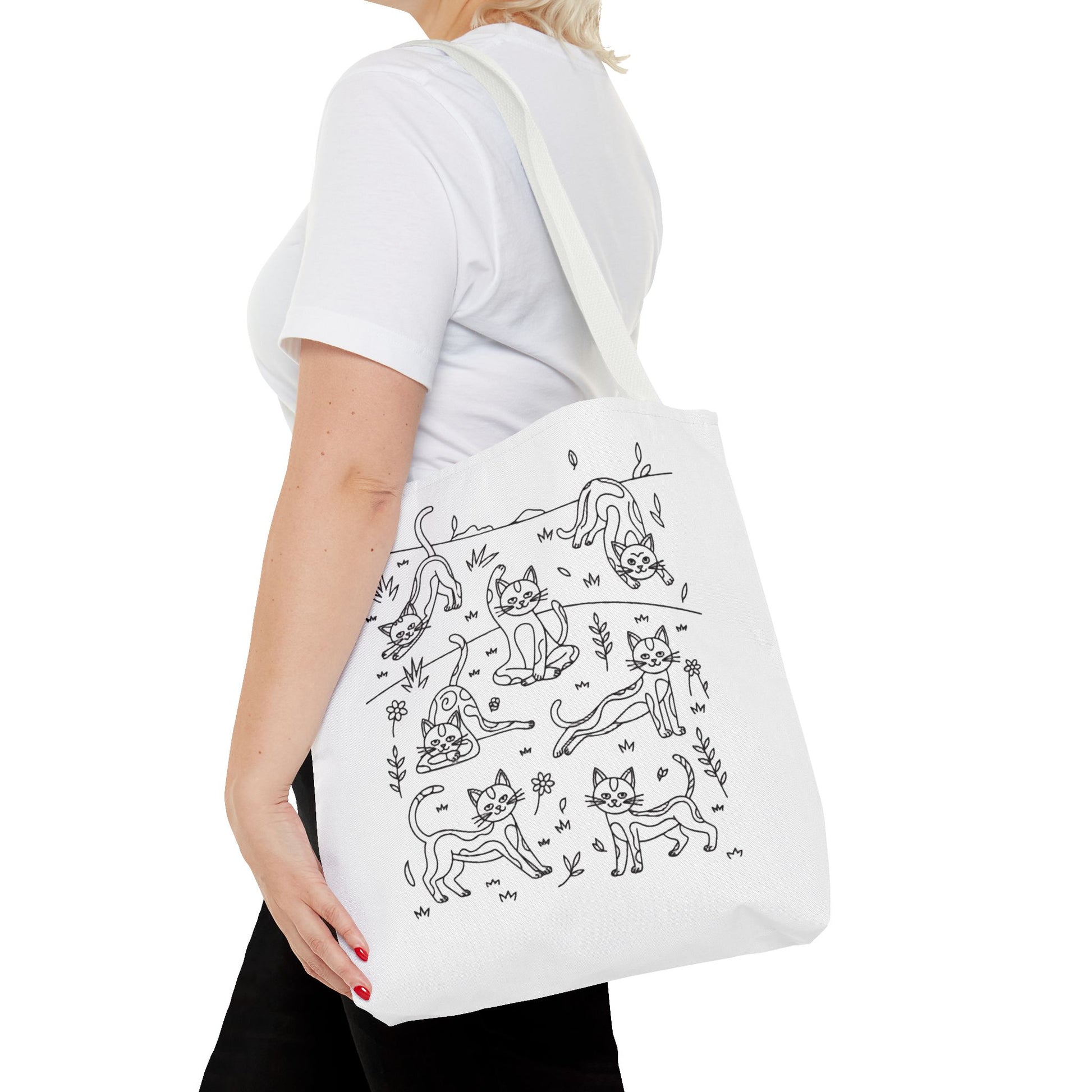 Yoga Cat Tote Bag: A durable polyester tote showcasing playful cat yoga poses, perfect for carrying daily essentials. Ideal for cat lovers and yoga enthusiasts seeking style and functionality from FireBrook Designs.