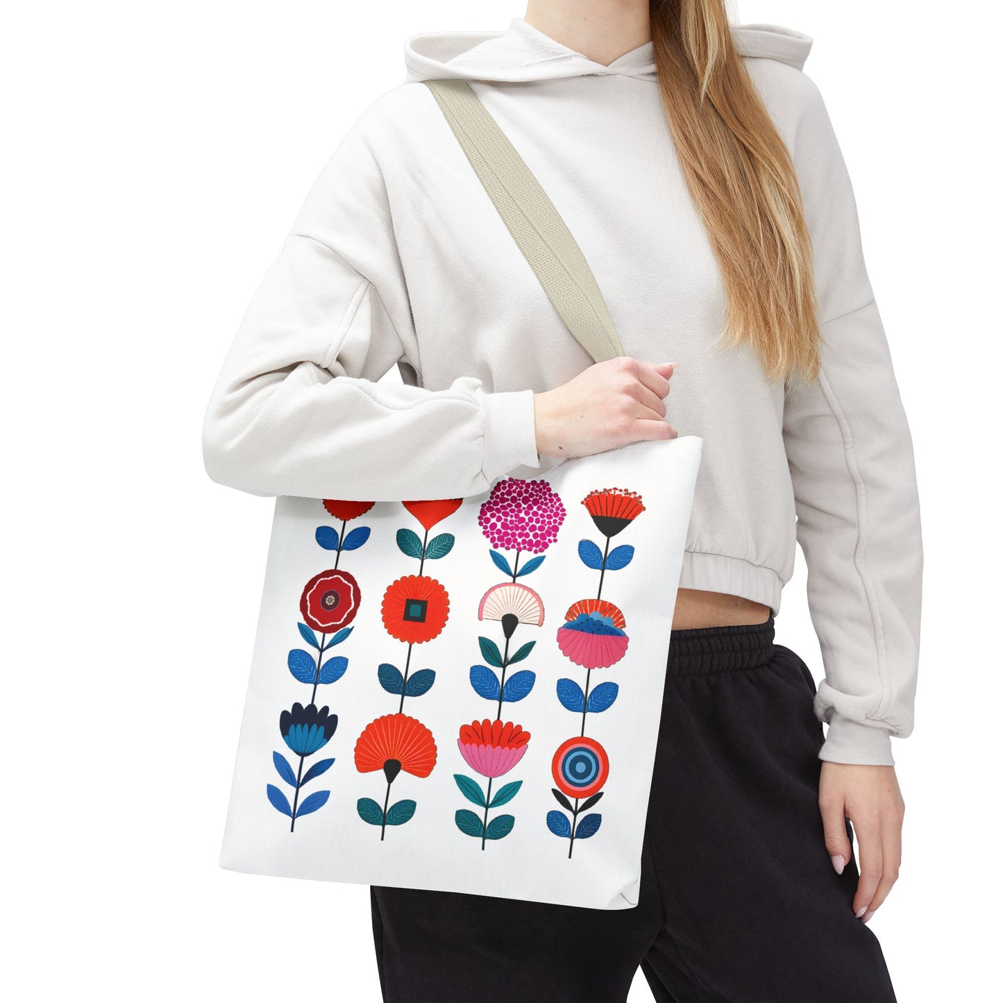 Floral Pattern Tote Bag held by a woman, featuring colorful flowers. Ideal for versatile use, combining style and practicality.
