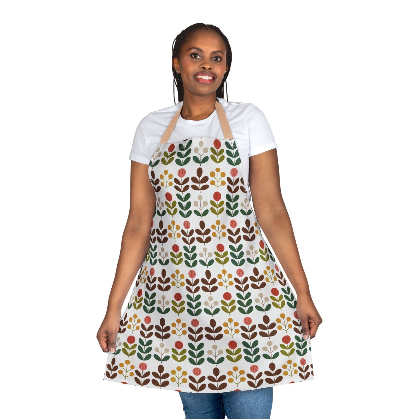 Flower Pattern Apron worn by a smiling woman, showcasing its vibrant floral design. Ideal for creative cooks or artists, this stylish apron enhances any kitchen or studio with comfort and color.