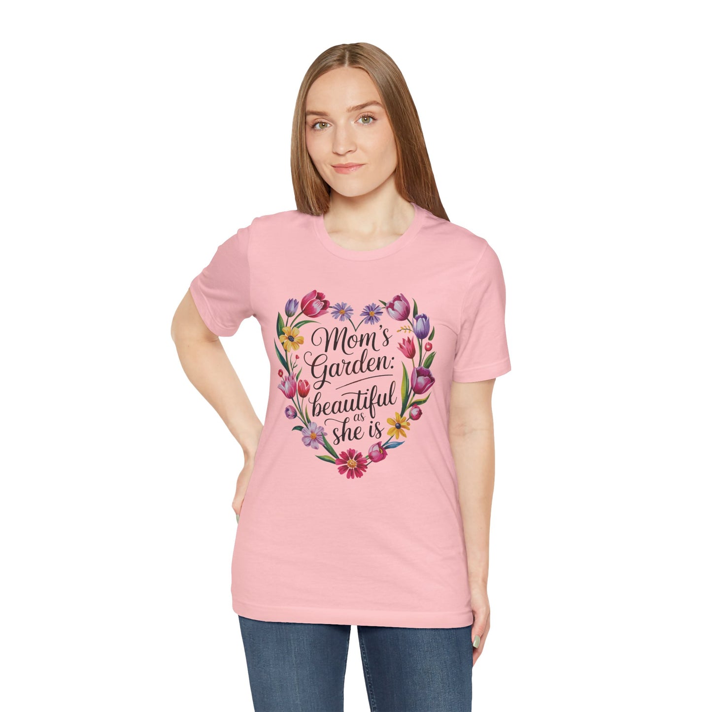 Mom's Garden is as Beautiful as She Is Mother's Day Comfort Colors Unisex T-Shirt worn by a woman, showcasing a floral heart design symbolizing love and appreciation. Ideal for celebrating special women.
