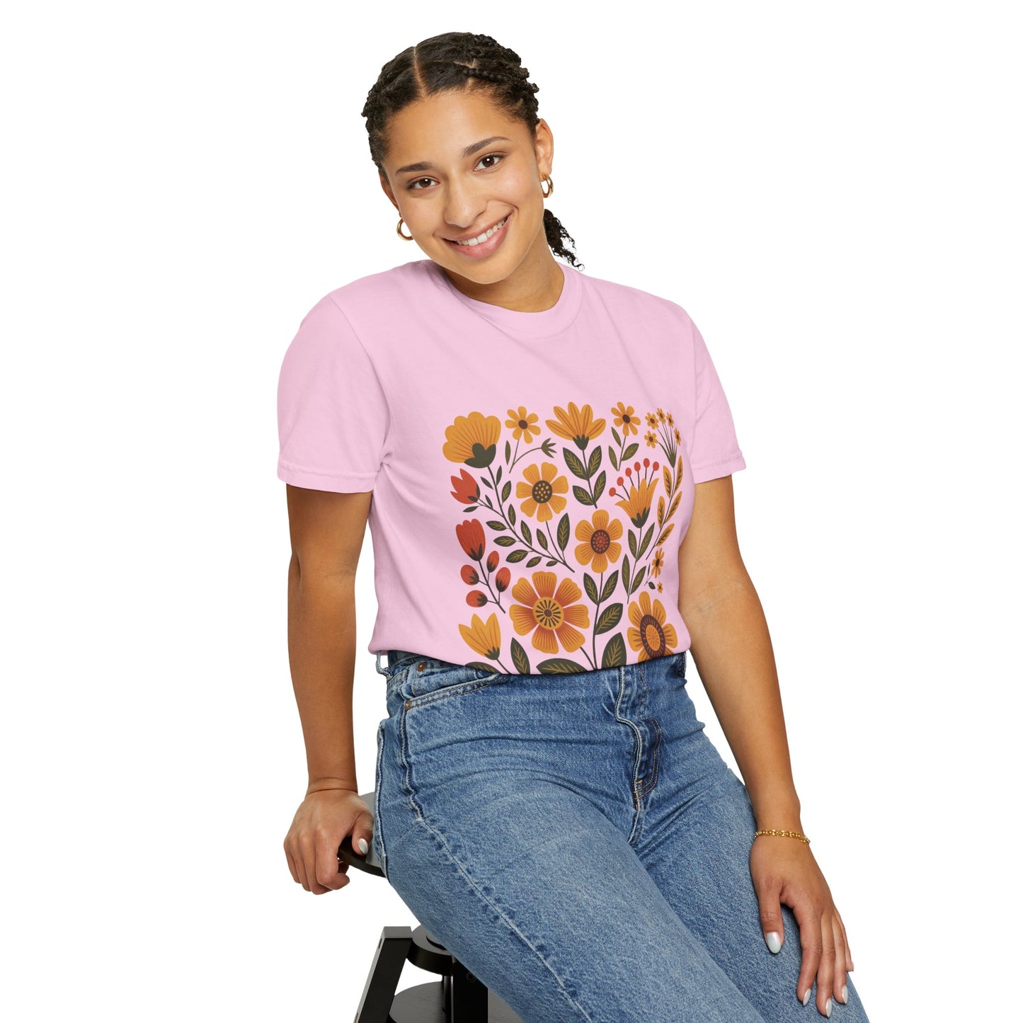 Folk Art in Warm Yellows Floral T-Shirt features artistic folk-inspired floral patterns in warm earth tones. Crafted from soft, high-quality cotton, it offers a relaxed fit, embodying FireBrook Essentials' joyful and uplifting style.