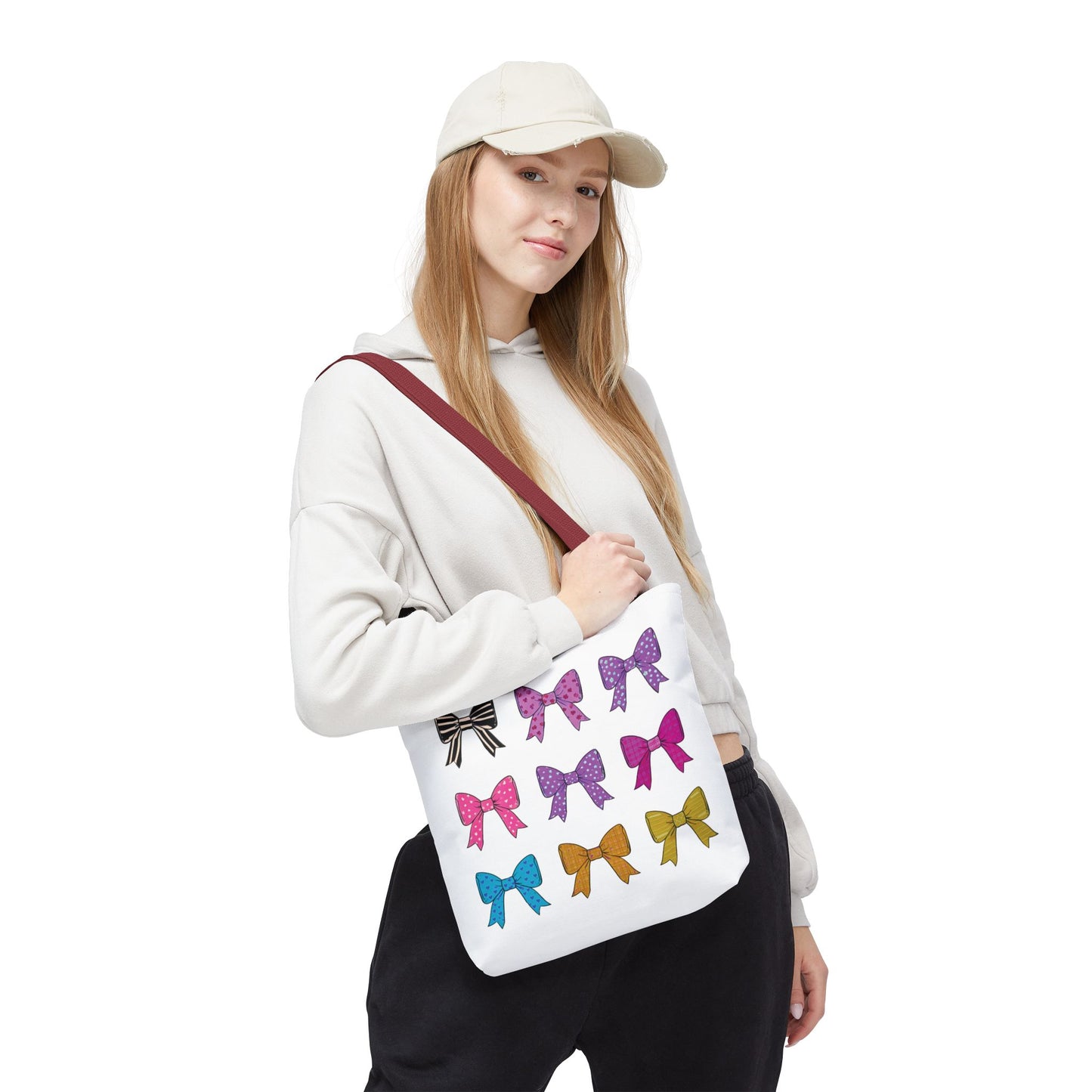 Bows Ribbons Tote Bag: A woman holds a stylish tote adorned with bows, perfect for fashion lovers seeking a practical, spacious accessory for daily use.