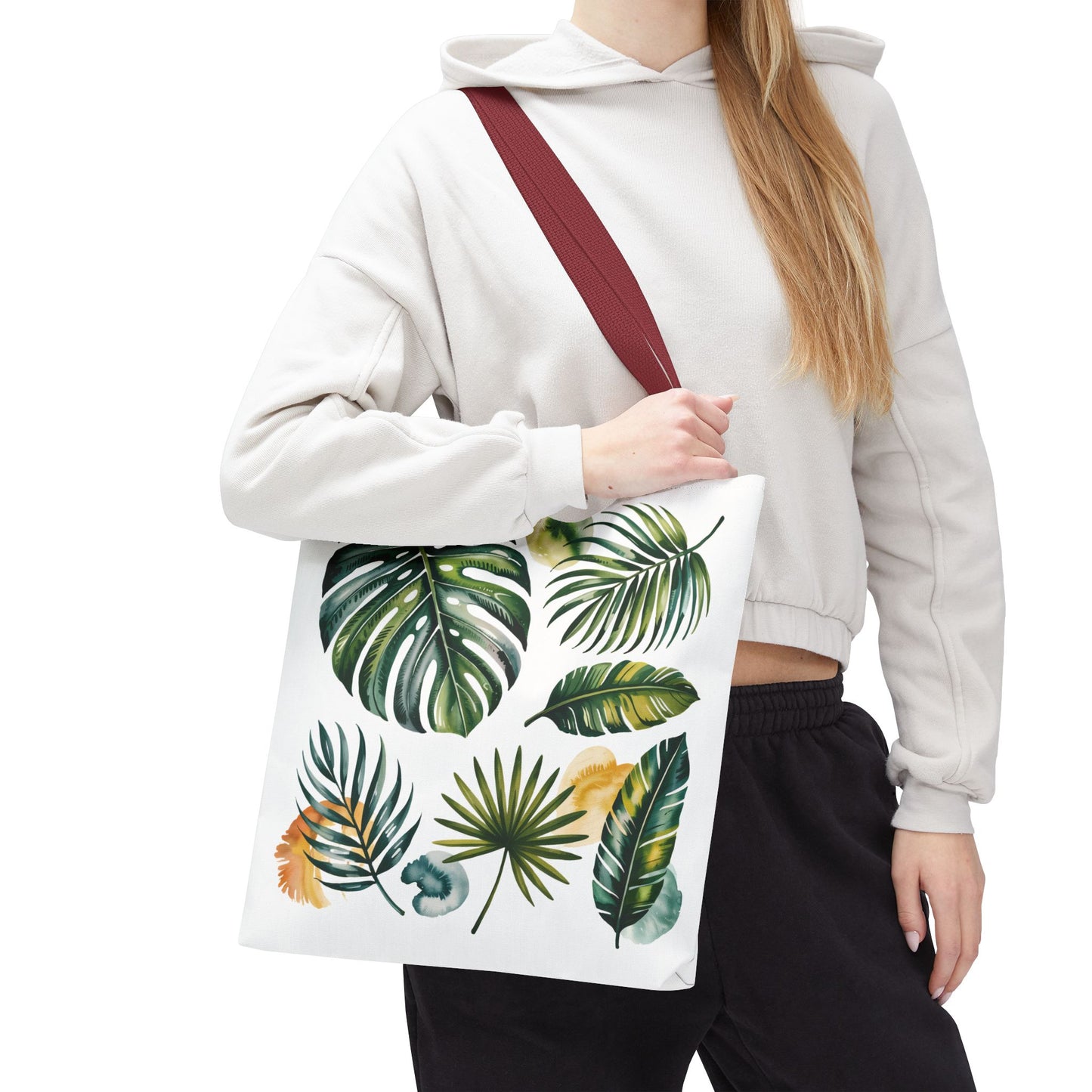 Tropical Leaves Tote Bag showcasing a vibrant leaf pattern, emphasizing a fresh, summery style. Ideal for carrying essentials, it embodies FireBrook Designs' commitment to joyful, stylish, and eco-conscious living.