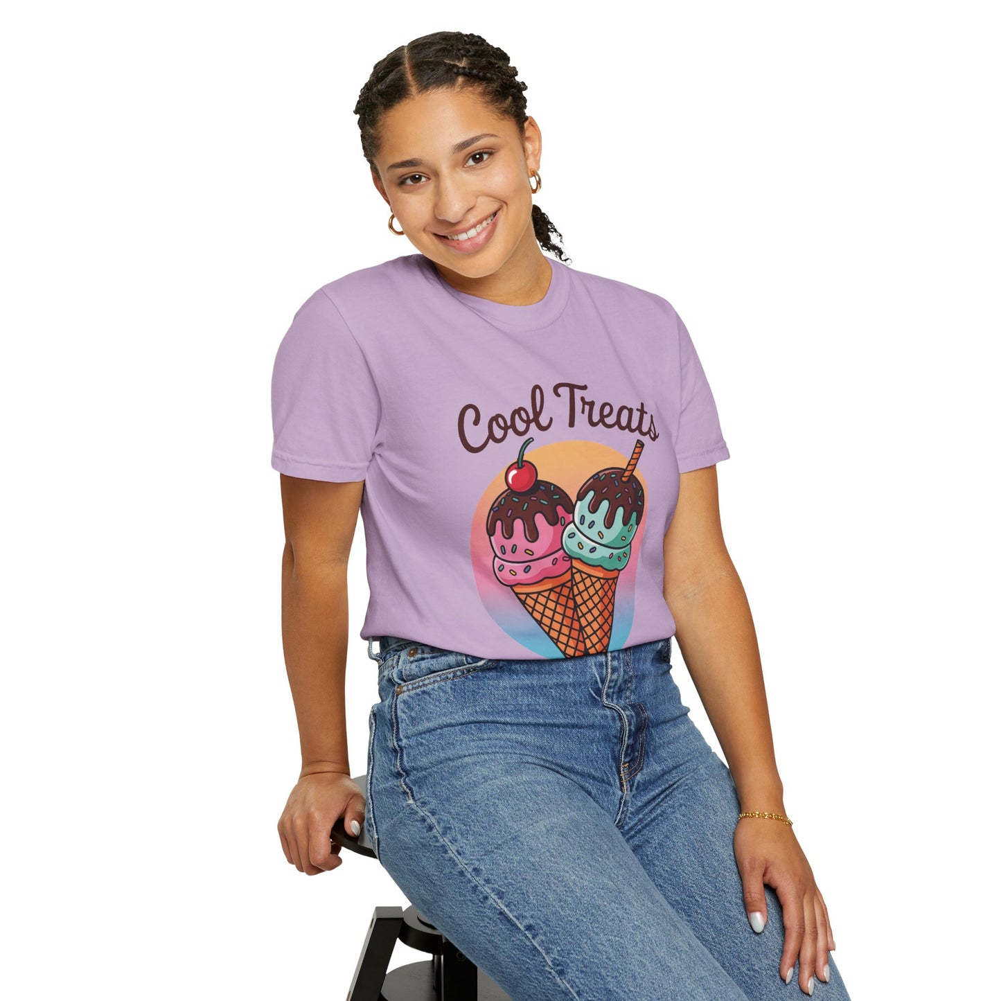 Ice Cream Cool Treats Comfort Colors Unisex T-Shirt modeled by a woman sitting on a stool, featuring playful ice cream cone prints, perfect for adding a fun, summery vibe to casual outfits.