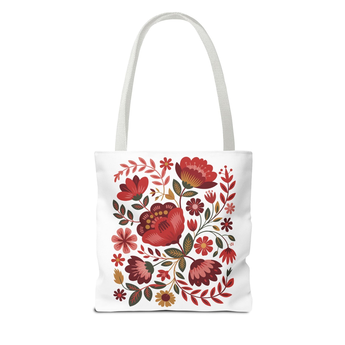 Red Floral Folk-Art Style Tote Bag featuring vibrant red and blush flowers with blue and green accents. Made from durable polyester, perfect for everyday use with reinforced handles for strength.