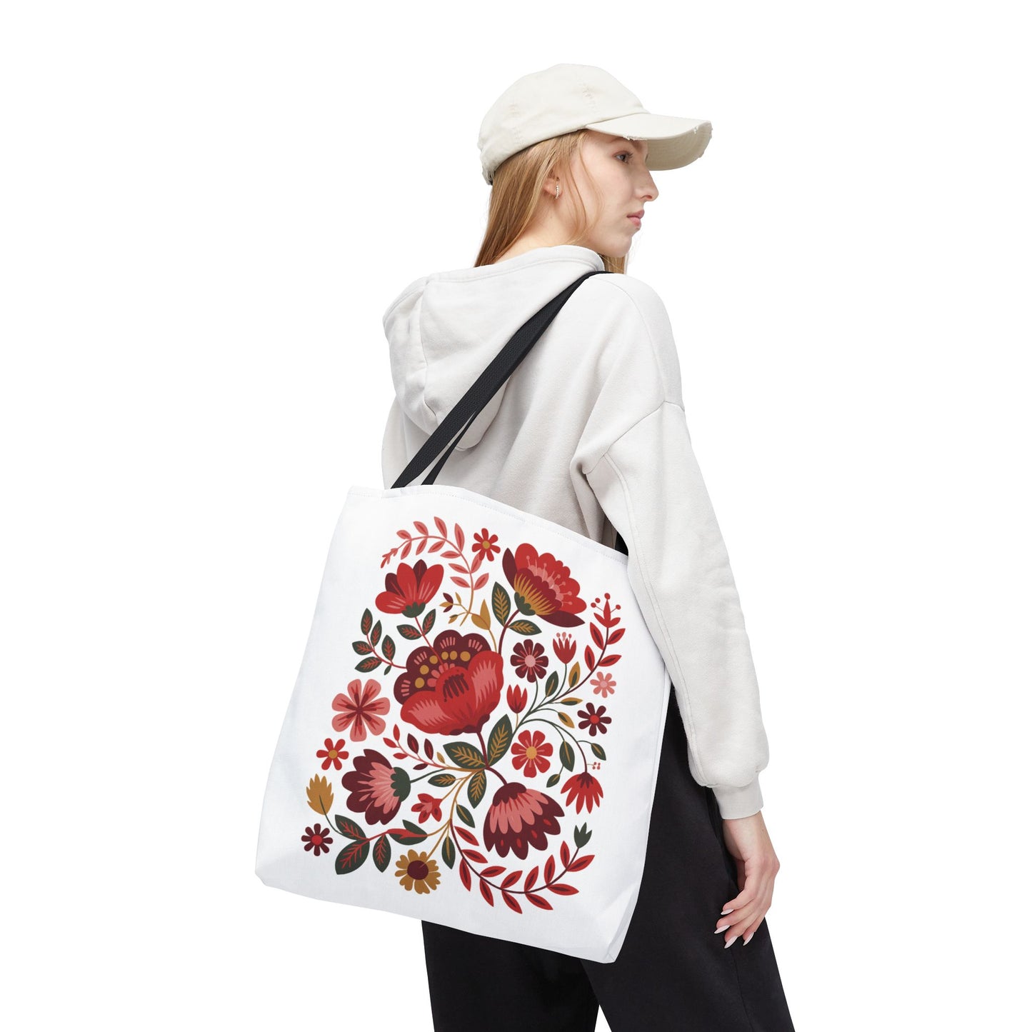 Red Floral Folk-Art Style Tote Bag showcasing vibrant red and blush flowers with green leaves, ideal for carrying essentials. Crafted from durable polyester with reinforced handles, perfect for nature lovers and art enthusiasts.