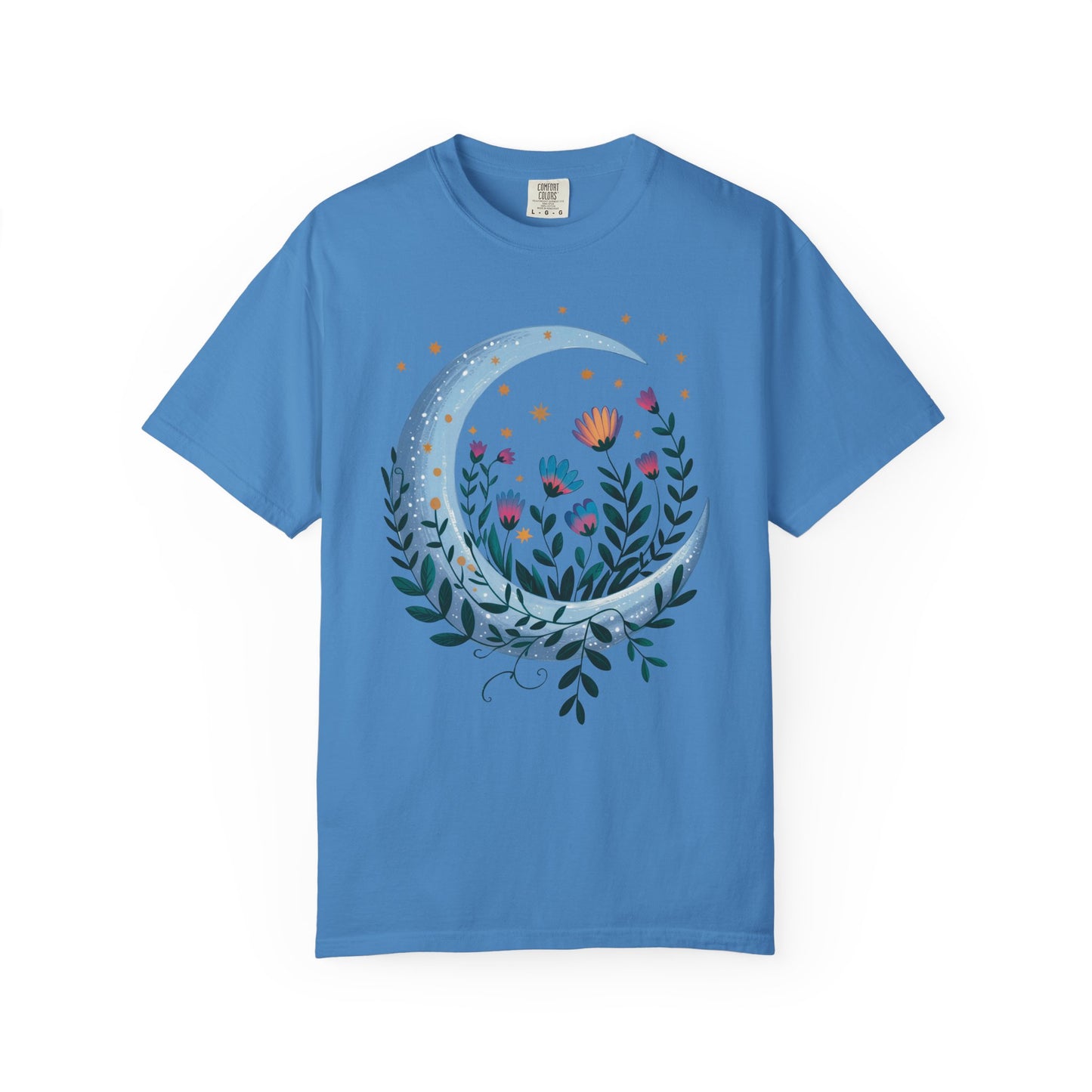 The Crescent Moon Floral T-shirt showcases a bohemian design with a crescent moon surrounded by delicate flowers, embodying a dreamy vibe. Perfect for casual outings, it features a relaxed fit and crew neckline.