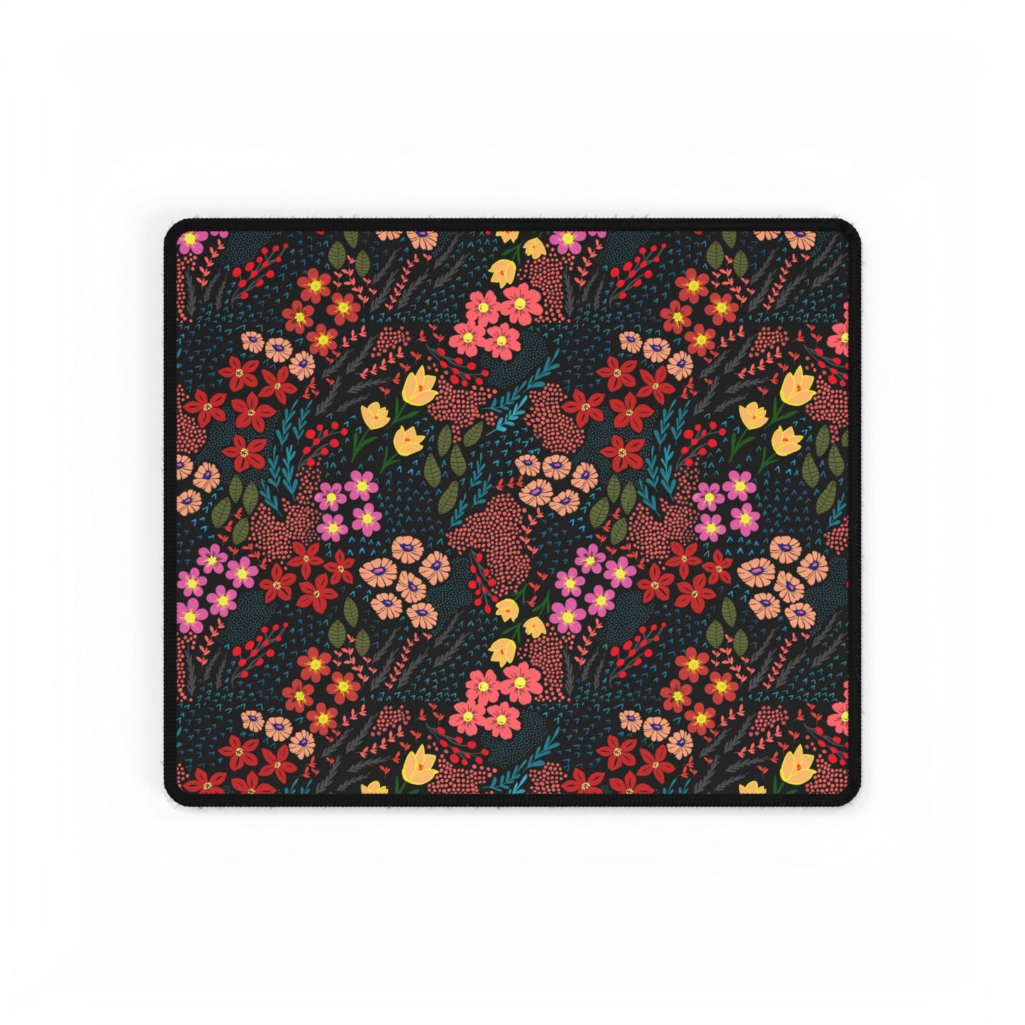 Desk Mat - Midnight Garden Floral Pattern features a dark field with vibrant floral motifs, ideal for nature enthusiasts. Its smooth surface and durable rubber base enhance your desk with colorful elegance.