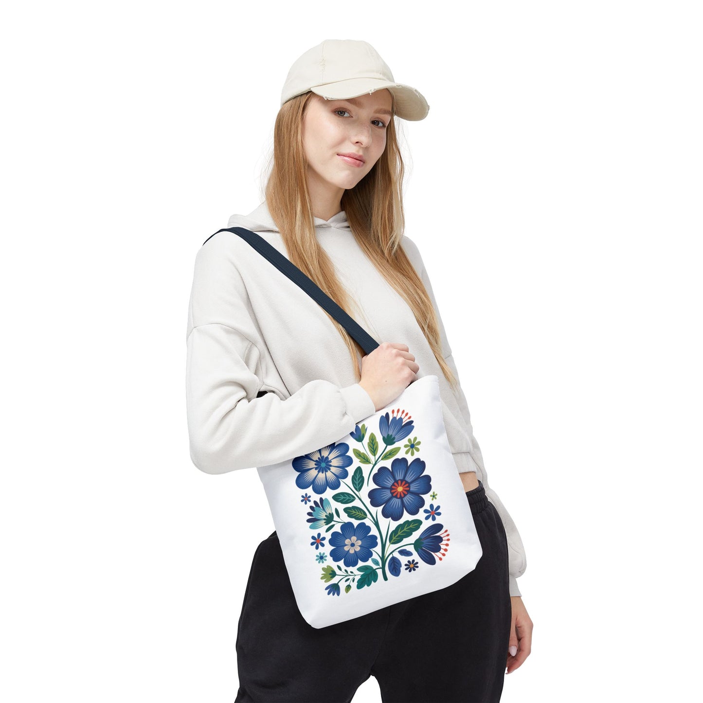 Vintage Blue Floral Tote Bag with a nostalgic design, featuring a durable 100% polyester body and reinforced handles. Available in three sizes, ideal for everyday use or gifting.